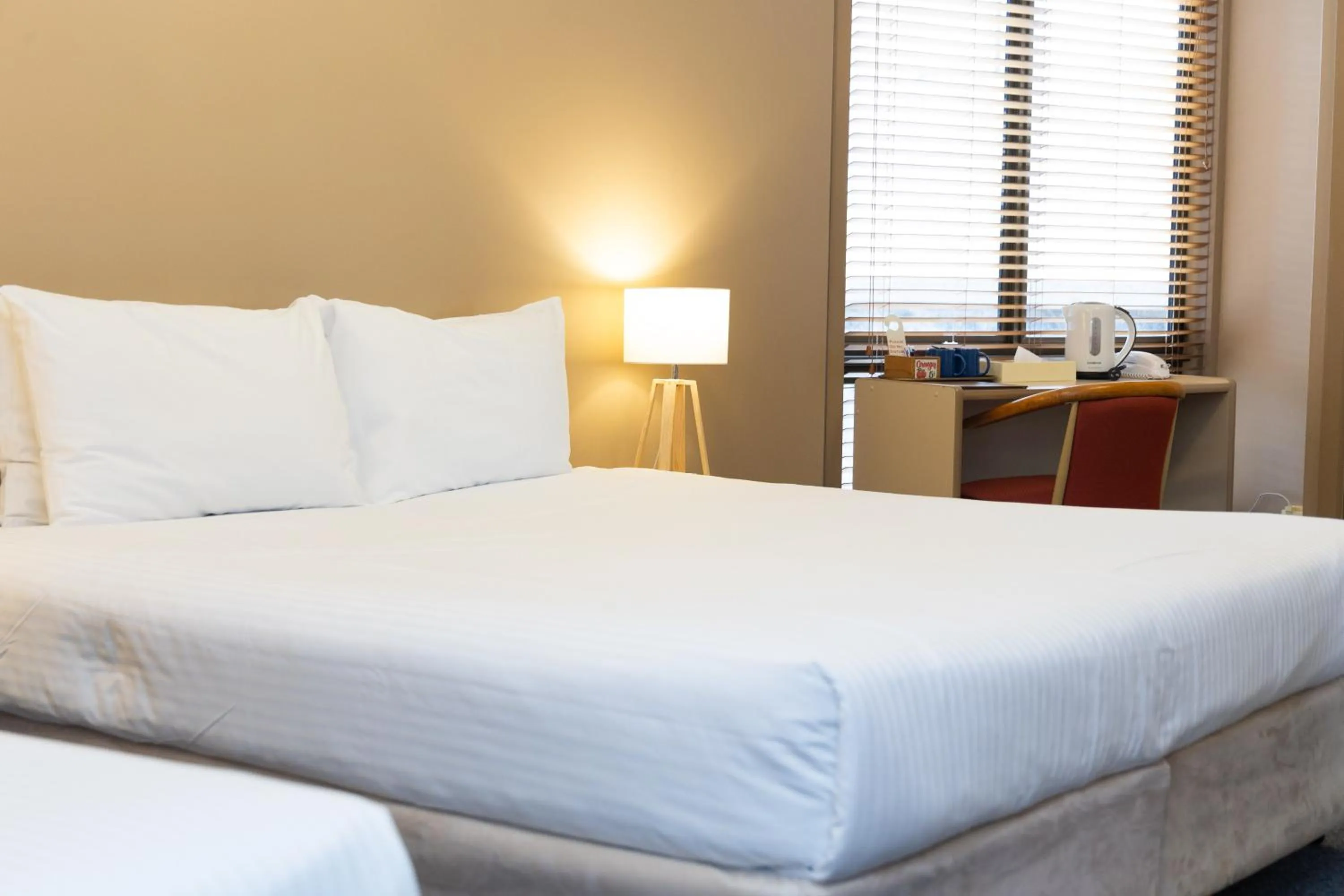 Bed in The Man from Snowy River Hotel