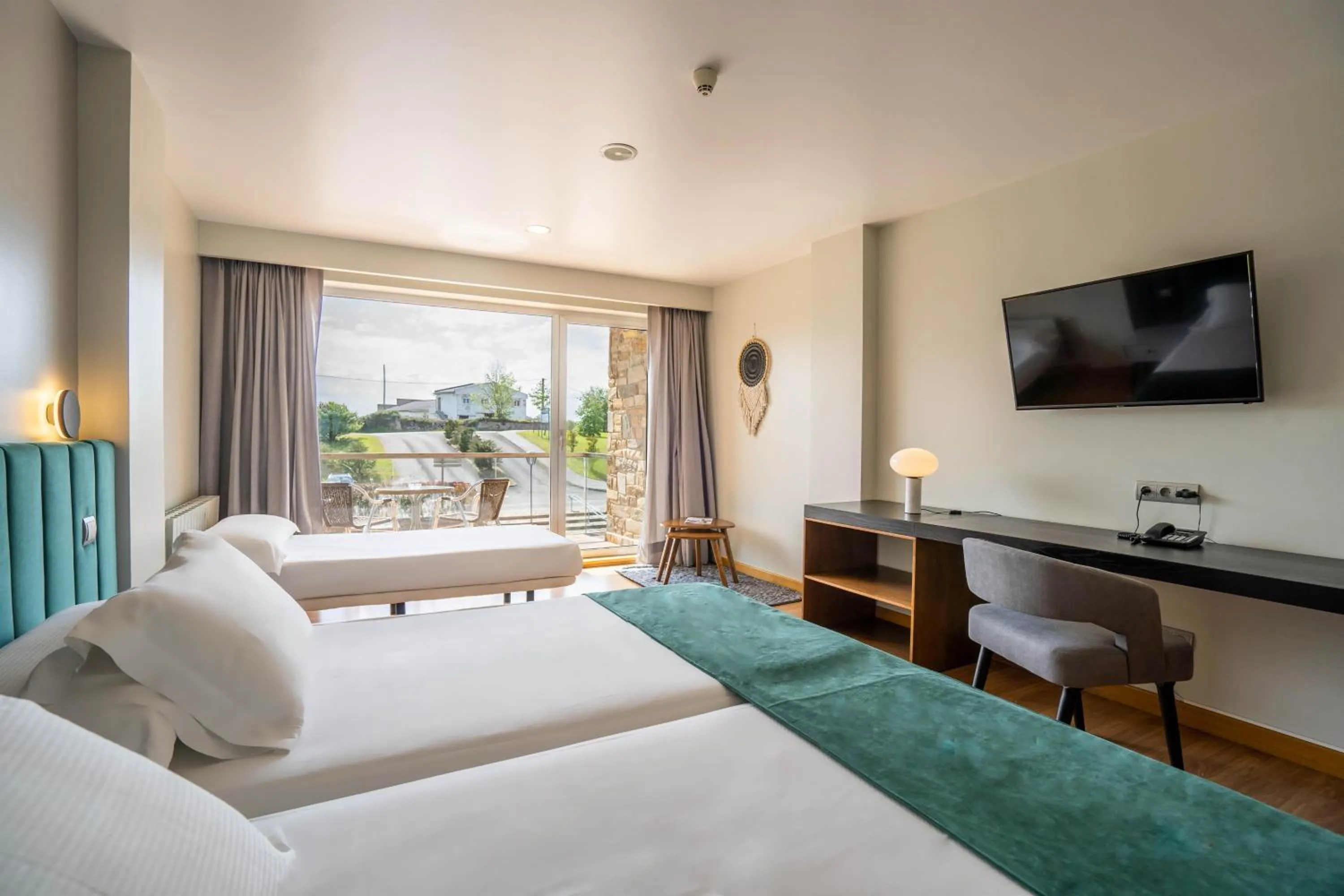 TV and multimedia, Bed in Abba Comillas Hotel