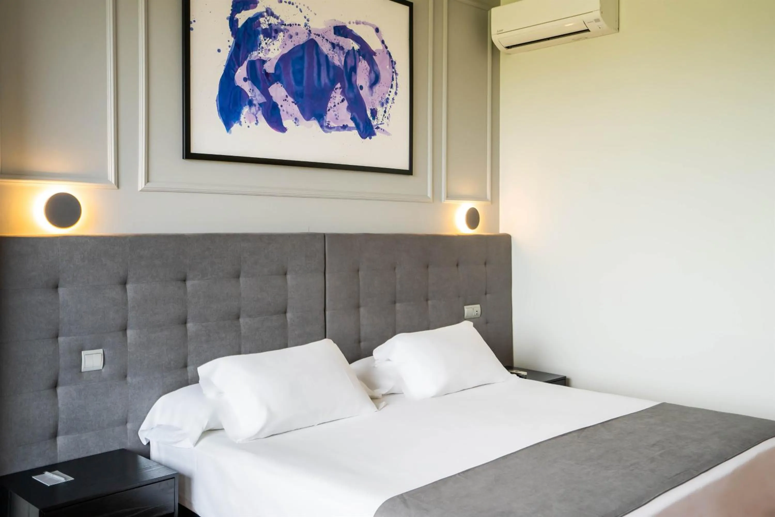 Bed in Abba Comillas Hotel