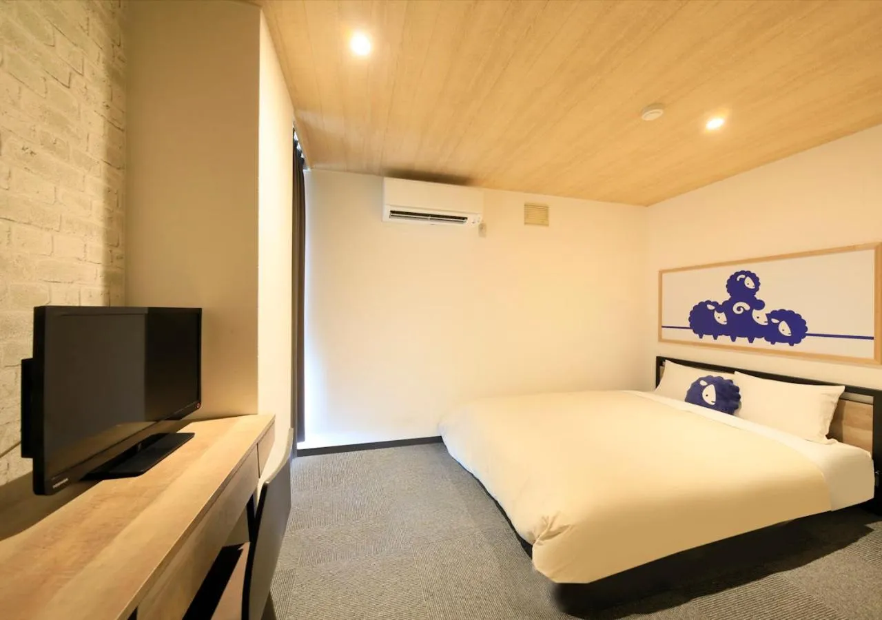 Photo of the whole room, Bed in Kokotel Hakodate