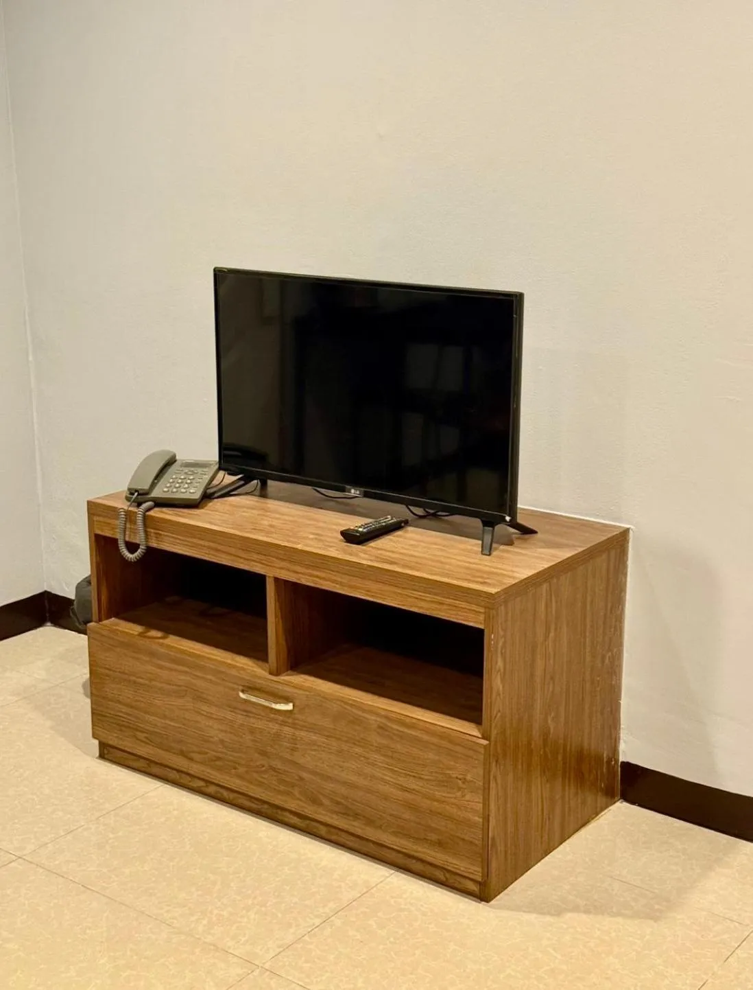 Communal lounge/ TV room in Sampheng Apartment