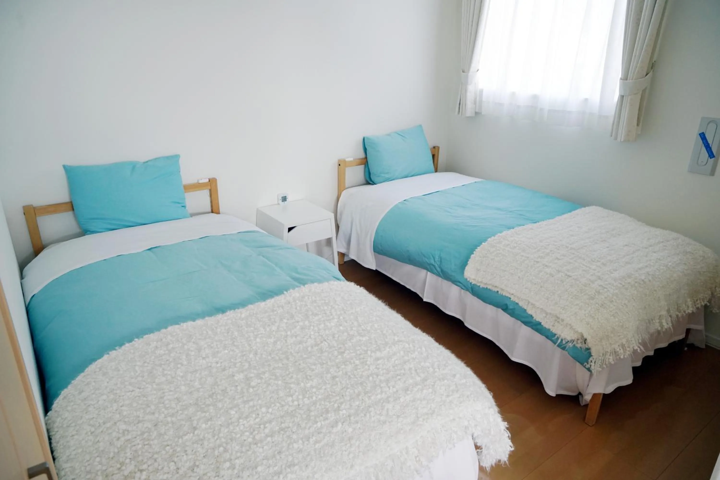 Bed in Villa Sapporo Honobono