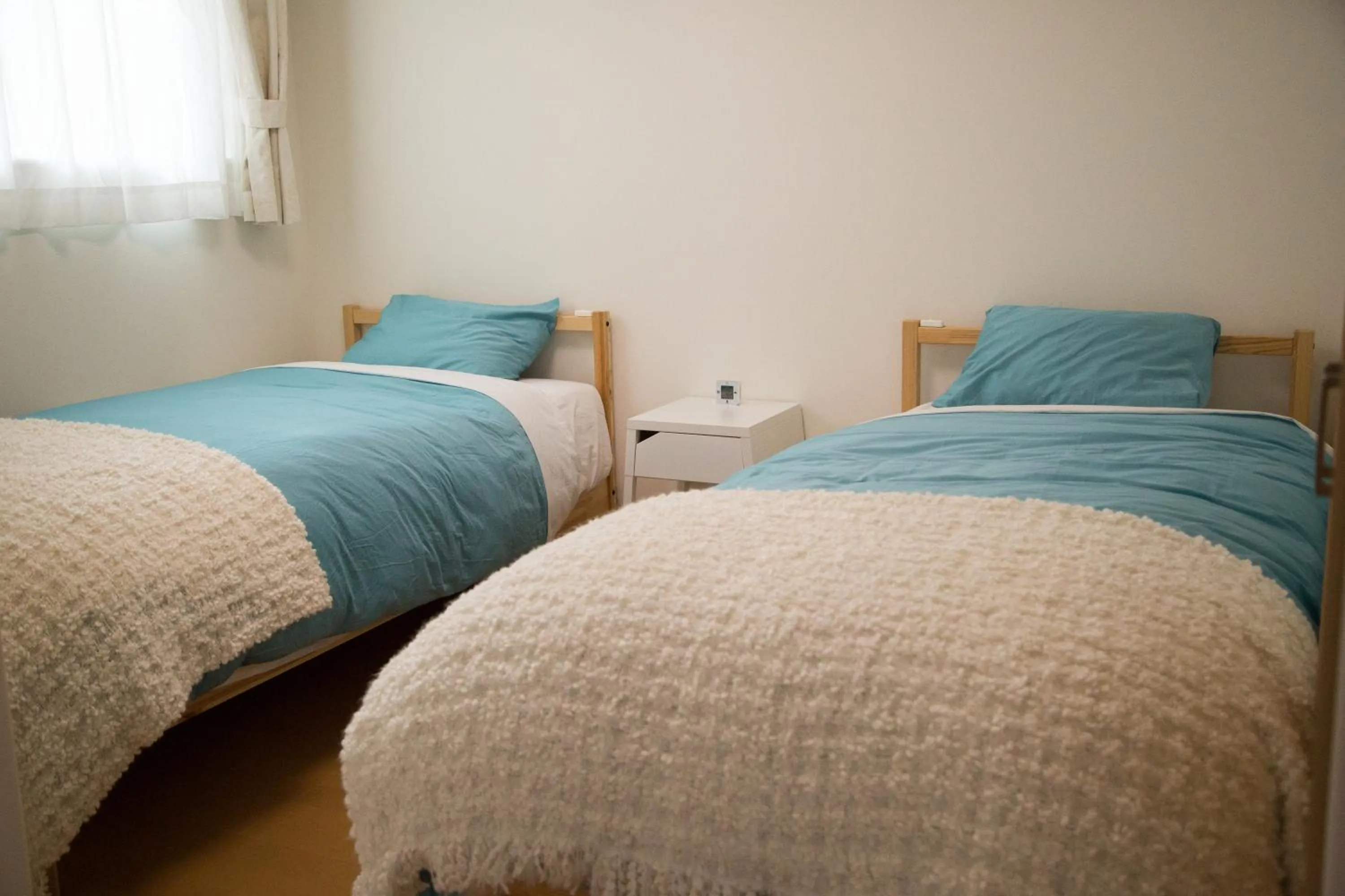 Bed in Villa Sapporo Honobono