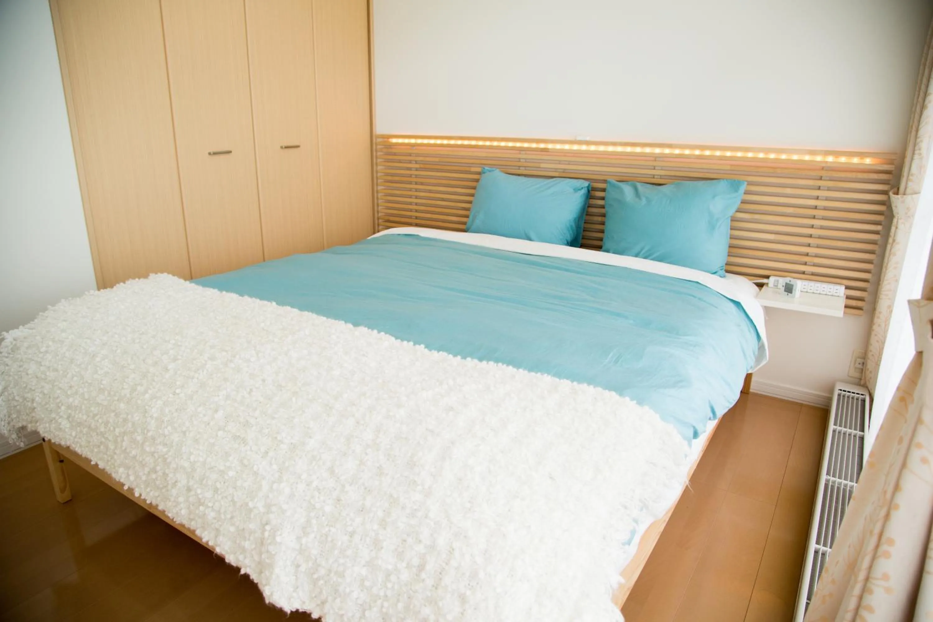 Bed in Villa Sapporo Honobono