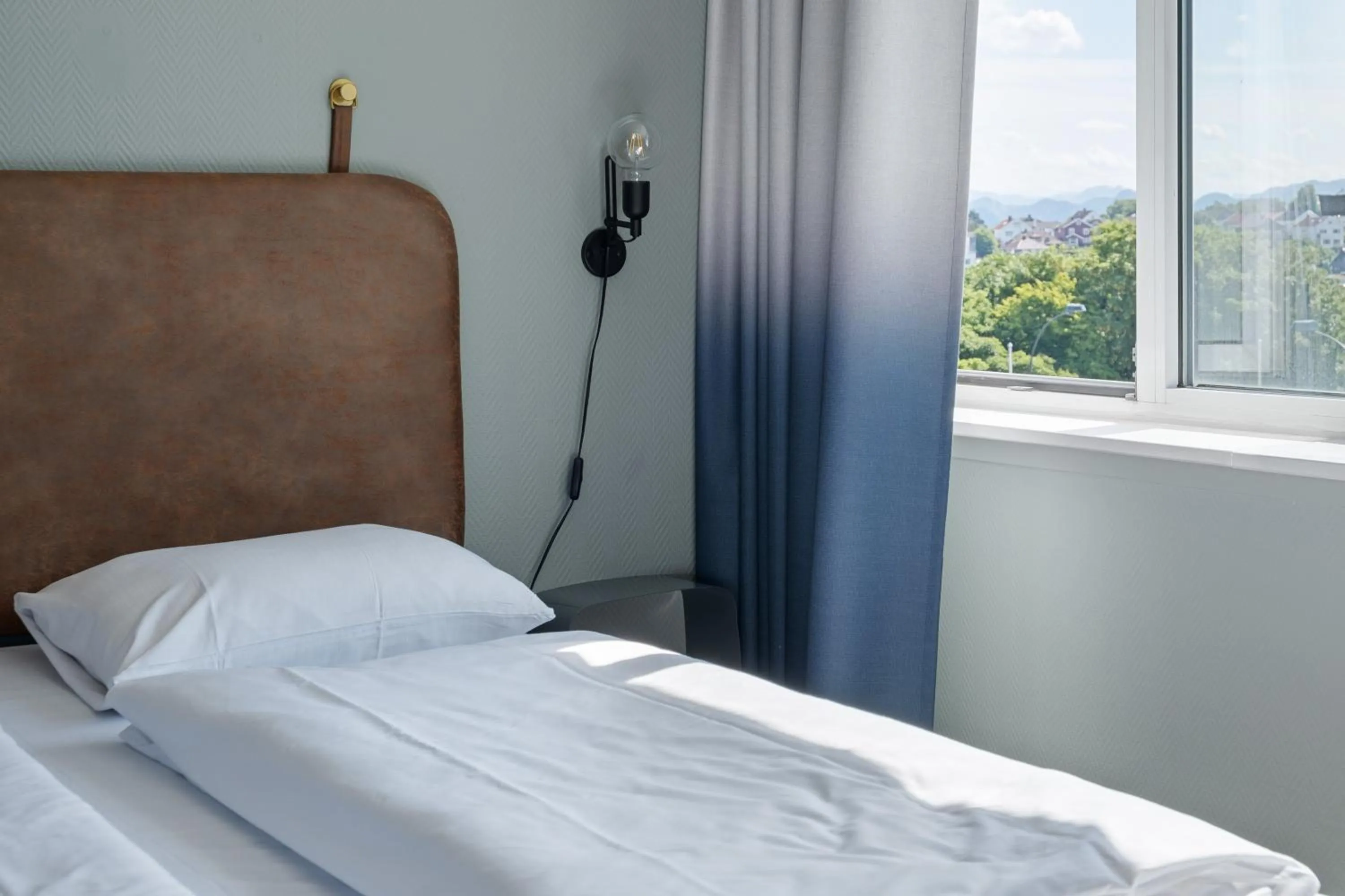 Bed in Bjørvika Apartments - Sirkus Renaa