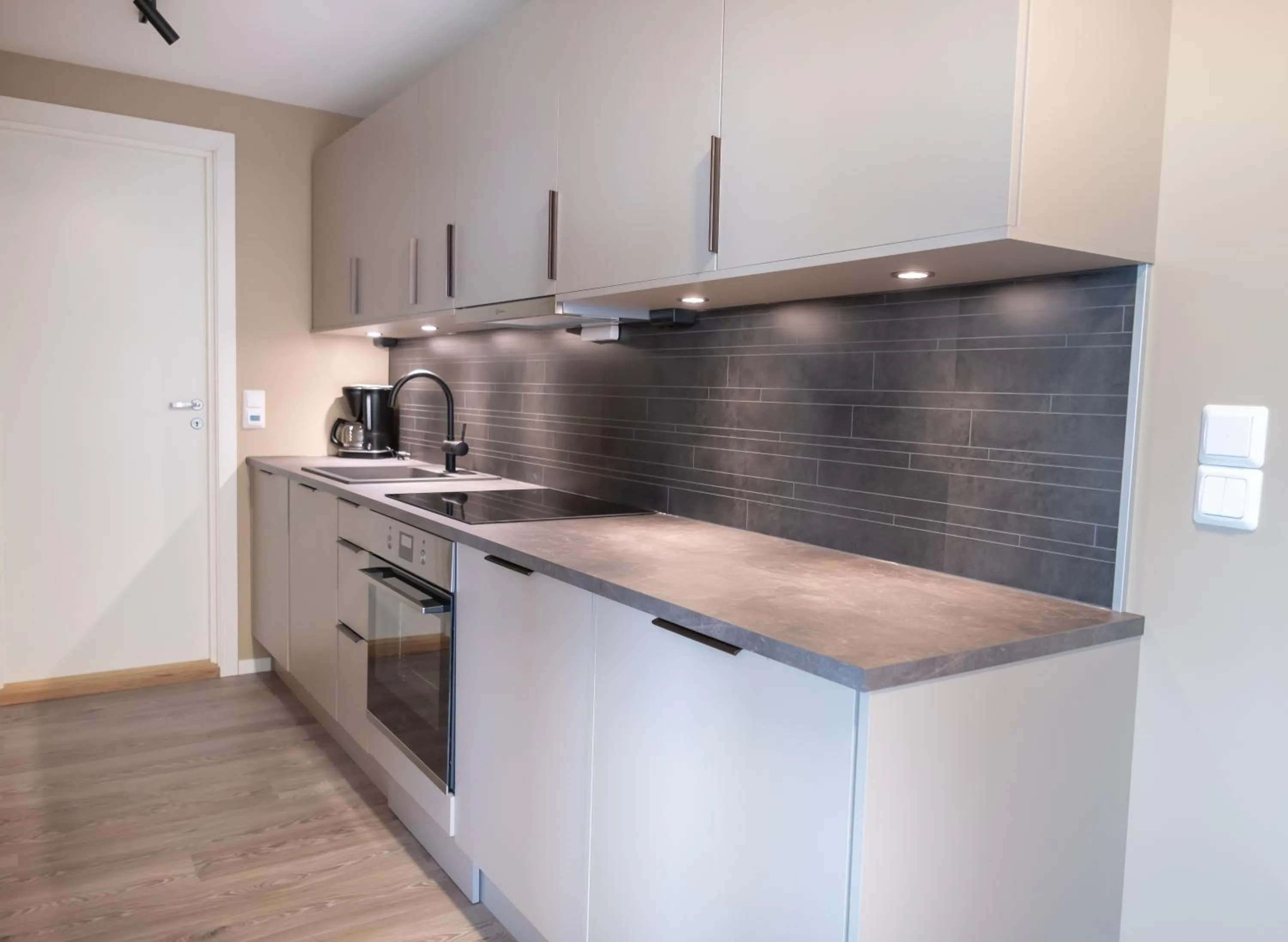 Kitchen or kitchenette in Bjørvika Apartments - Sirkus Renaa