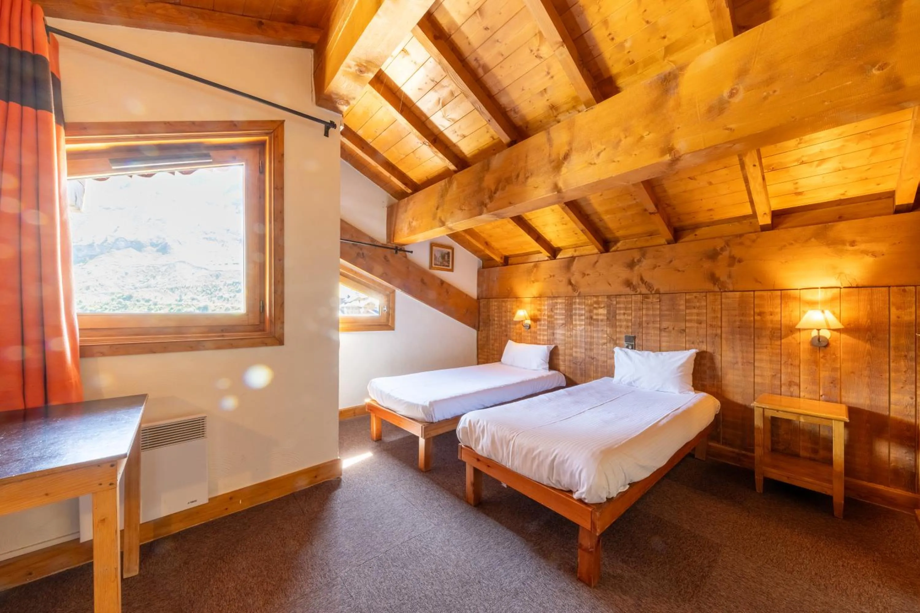 Bed in Résidences Village Montana by Les Etincelles