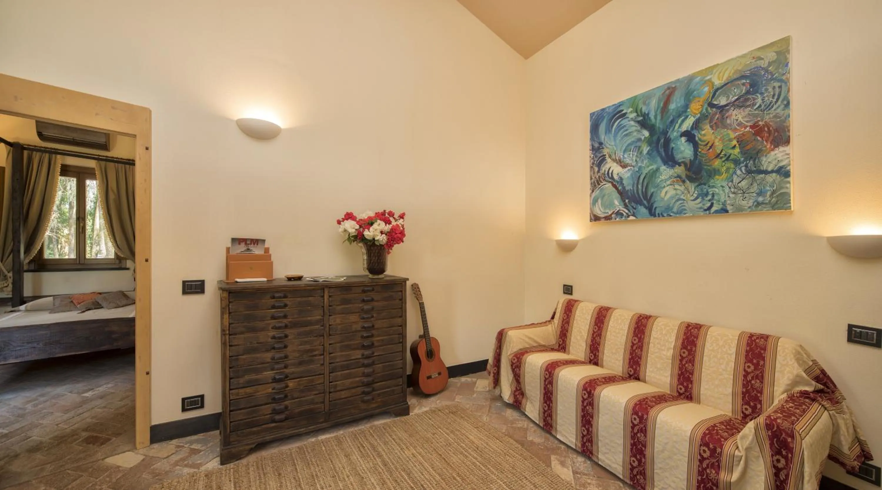 Living room, Bed in Resort La Ghiaia