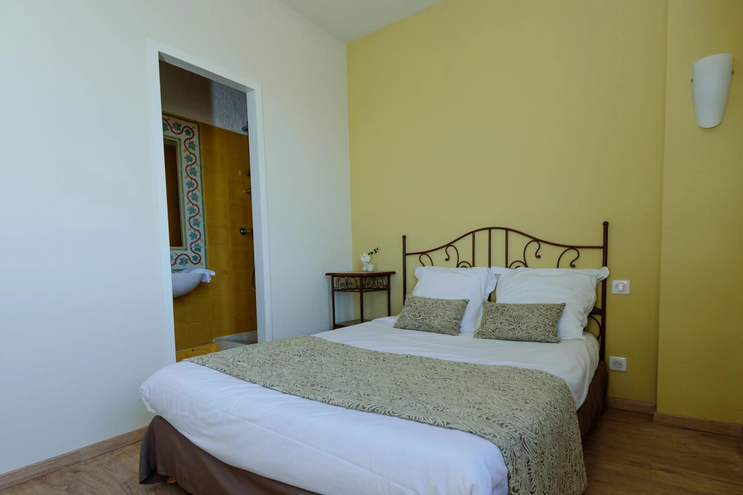 Bed in Hôtel Belesso