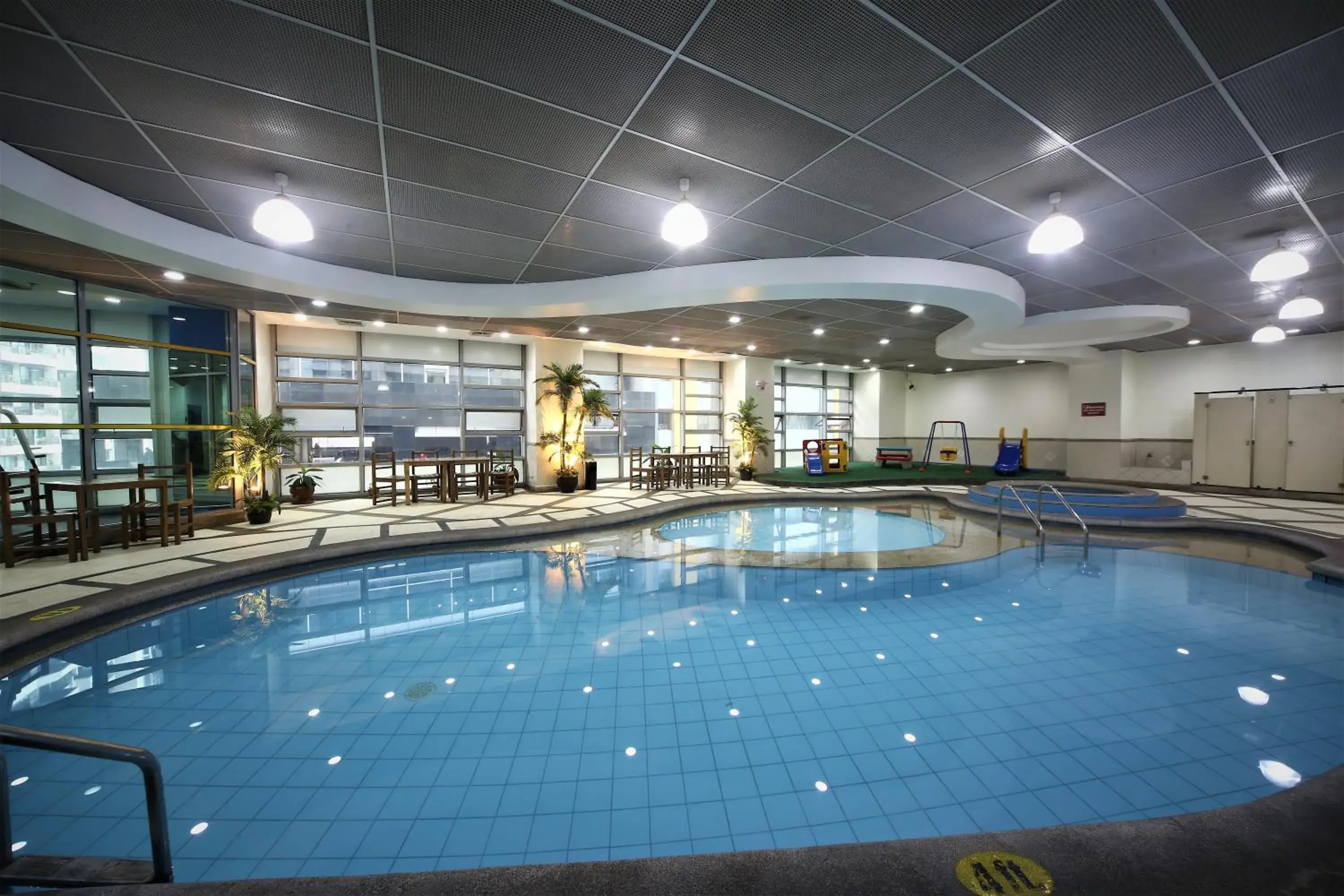 Swimming pool in Infinity Tower Suites Swimming pool in Infinity Tower Suites