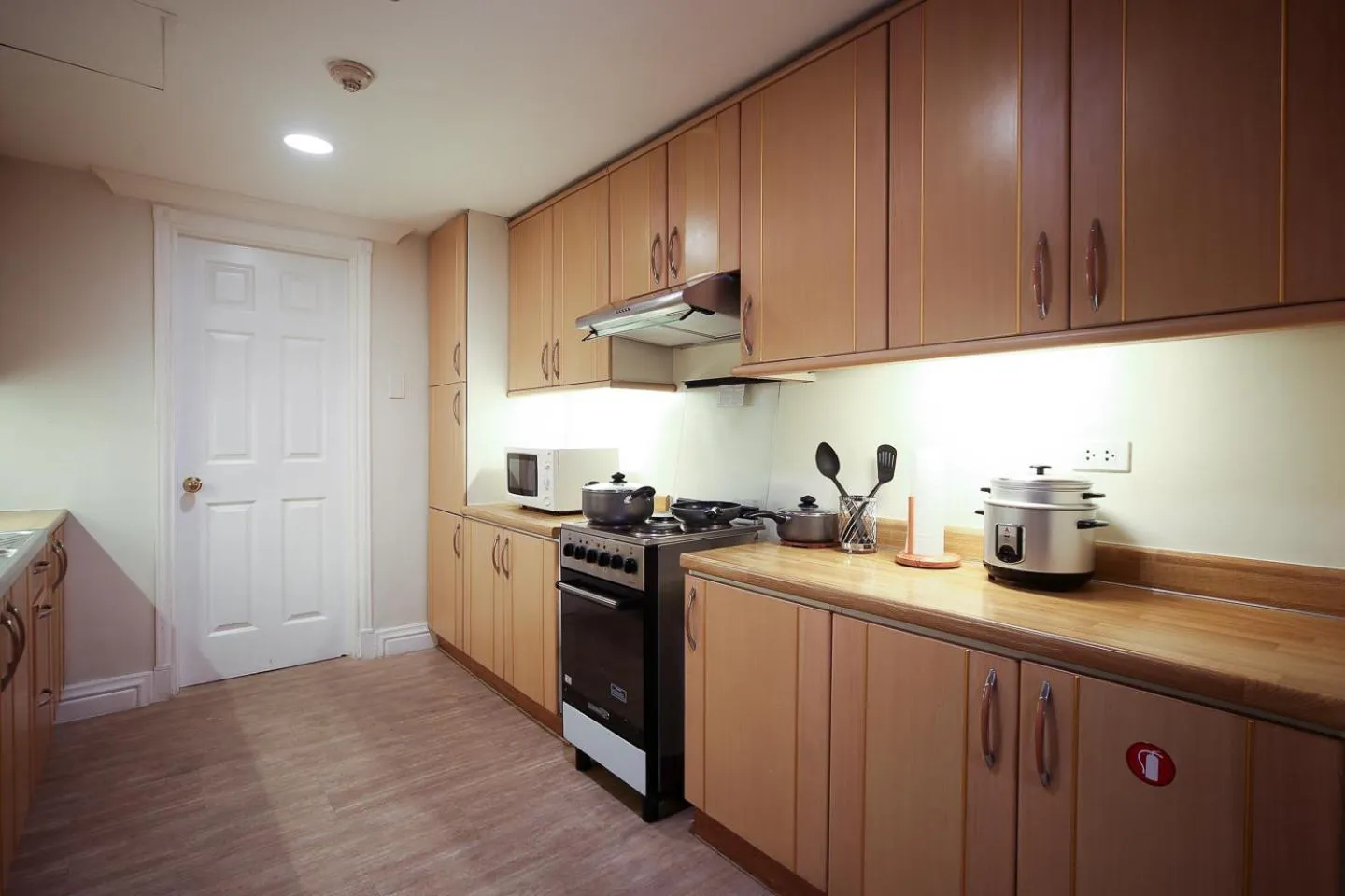 Kitchen or kitchenette in Infinity Tower Suites