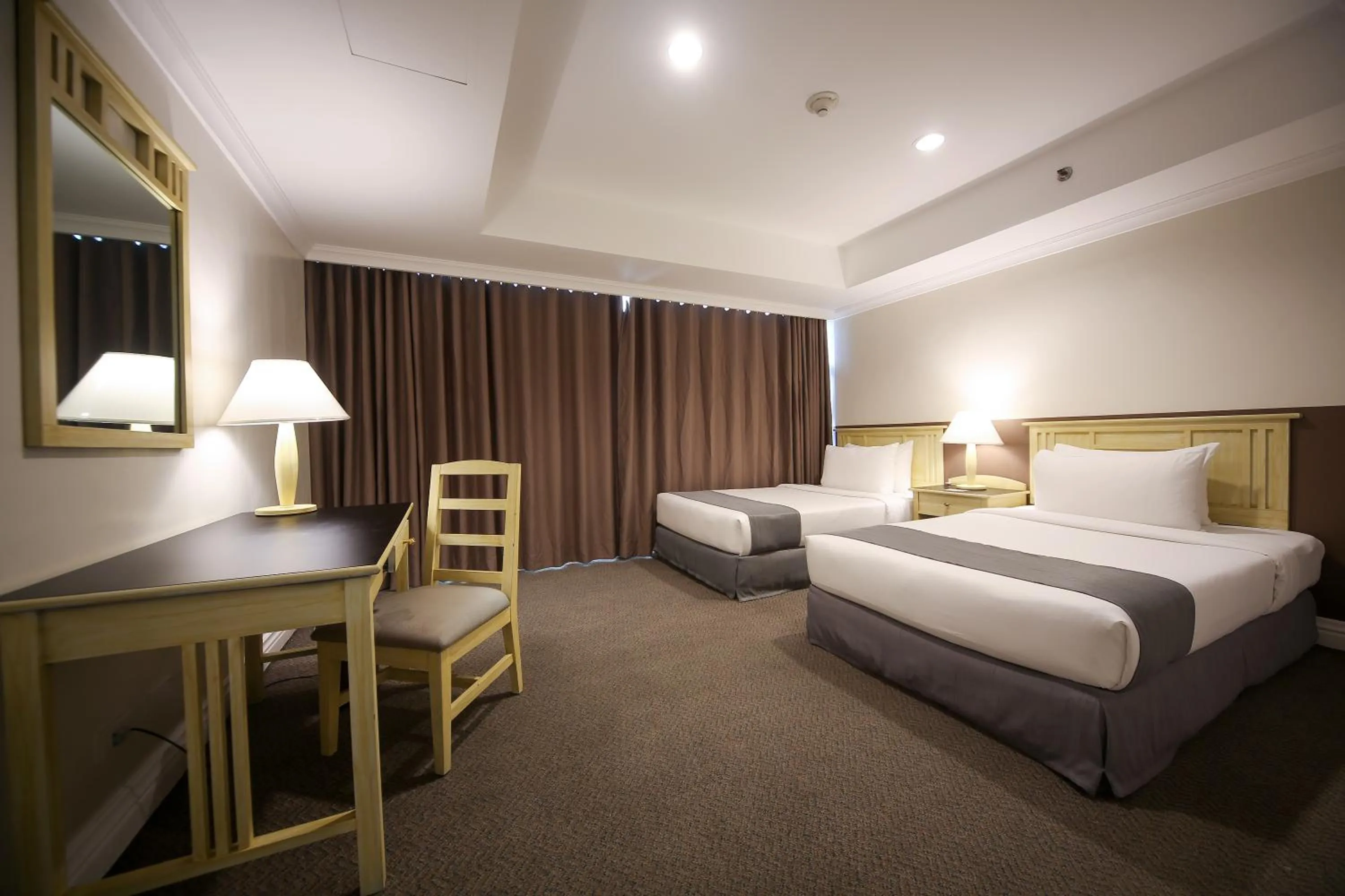 Bedroom in Infinity Tower Suites