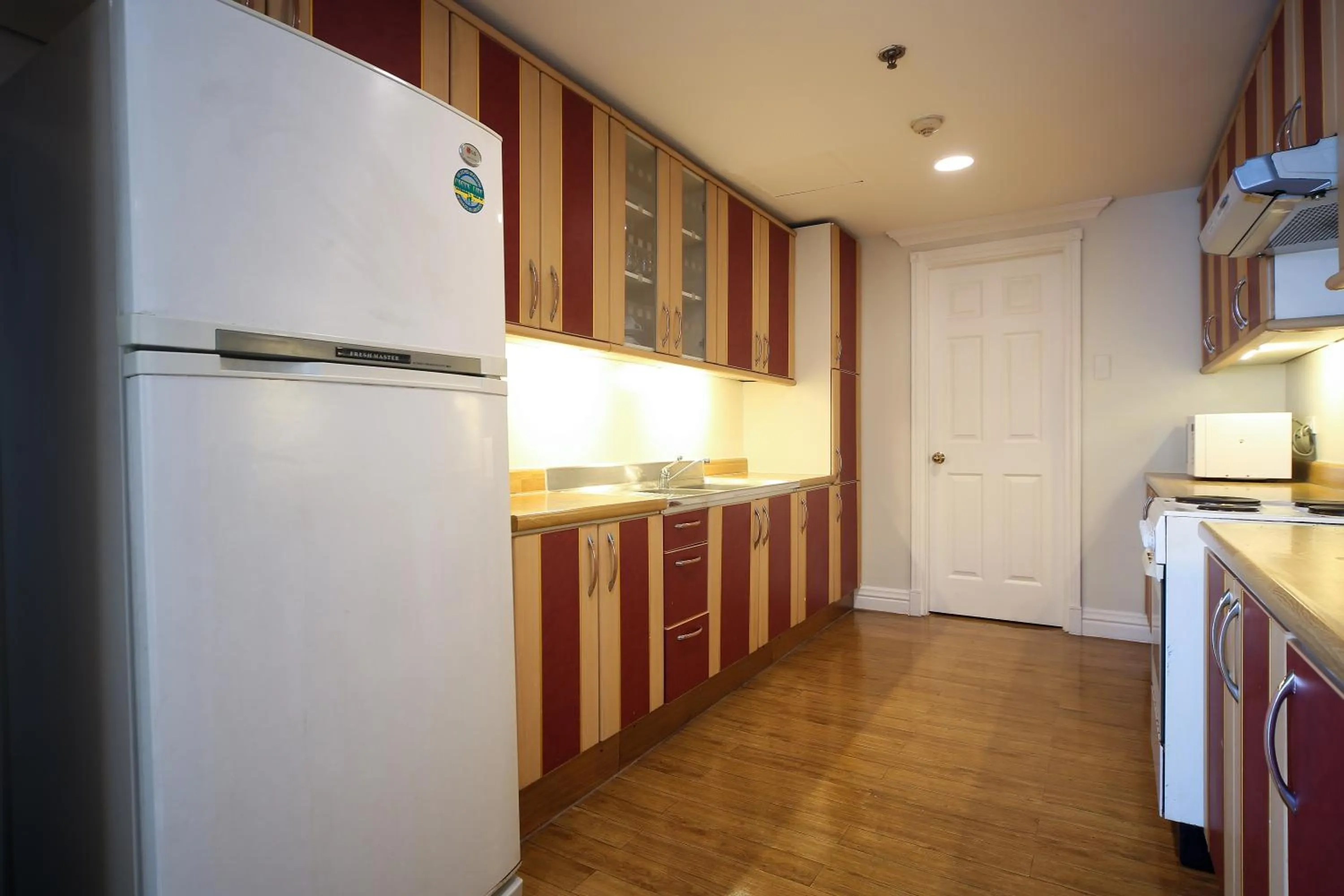 Kitchen or kitchenette in Infinity Tower Suites