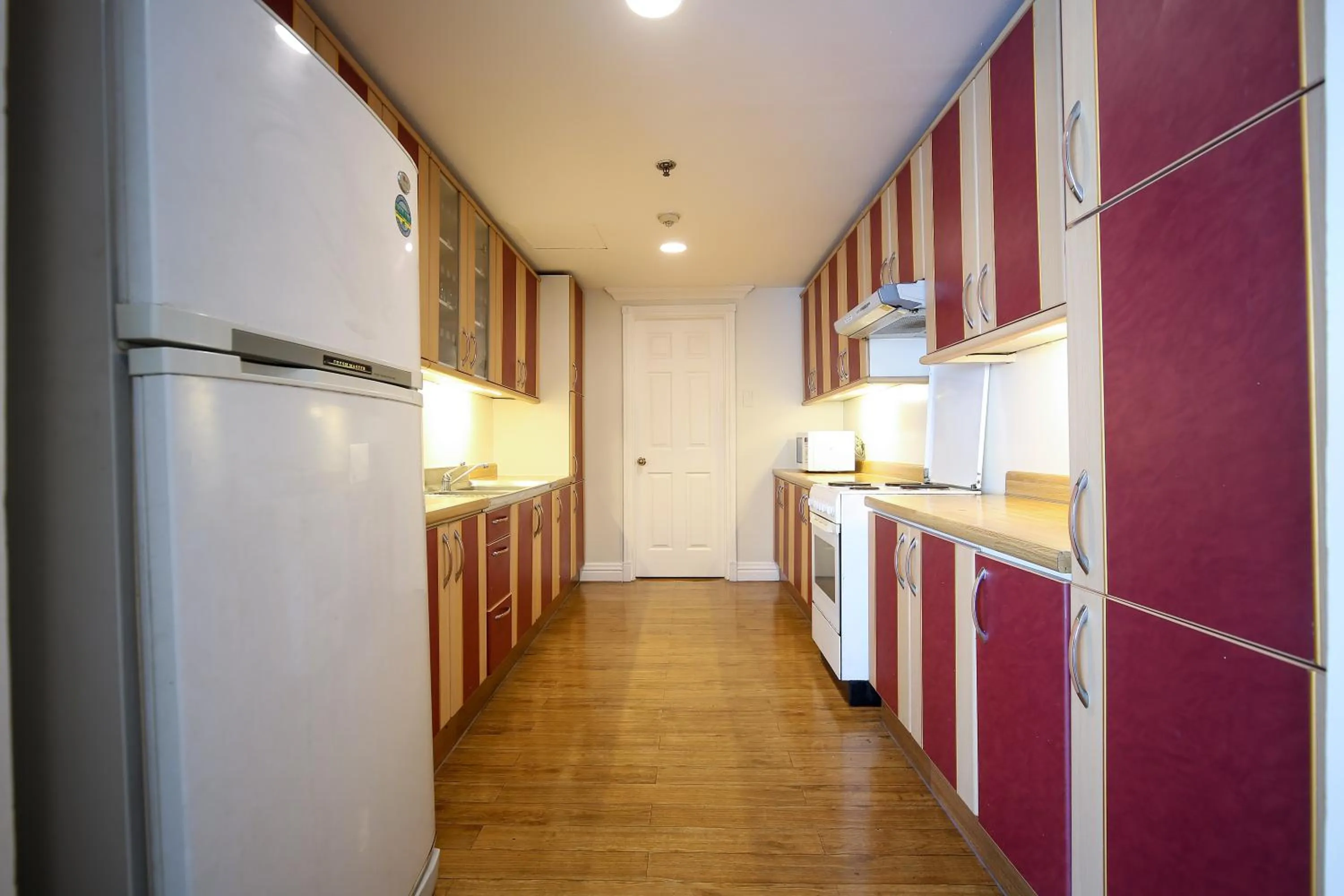 Kitchen or kitchenette in Infinity Tower Suites