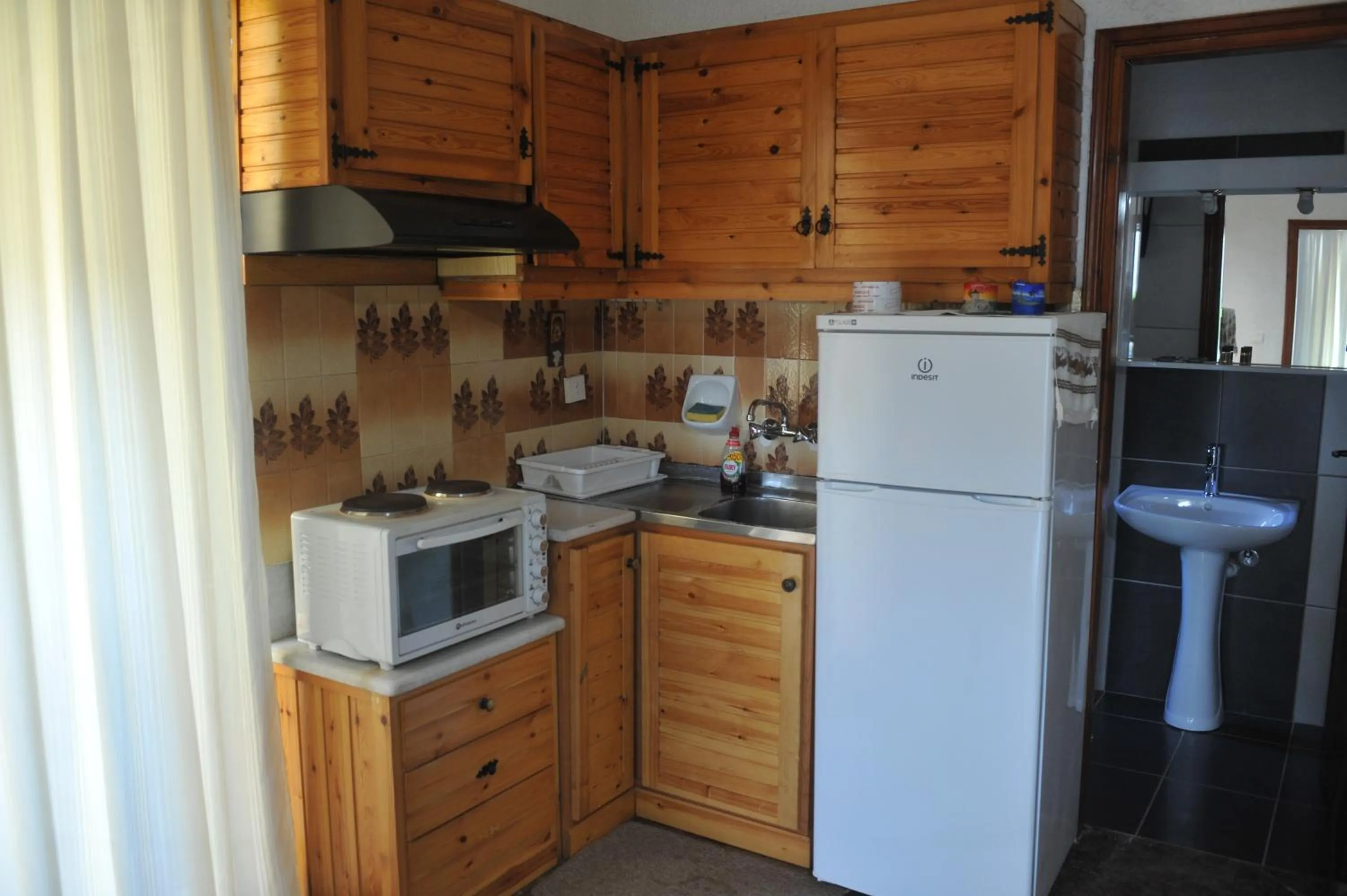 Kitchen or kitchenette in Chaliotis Apartments