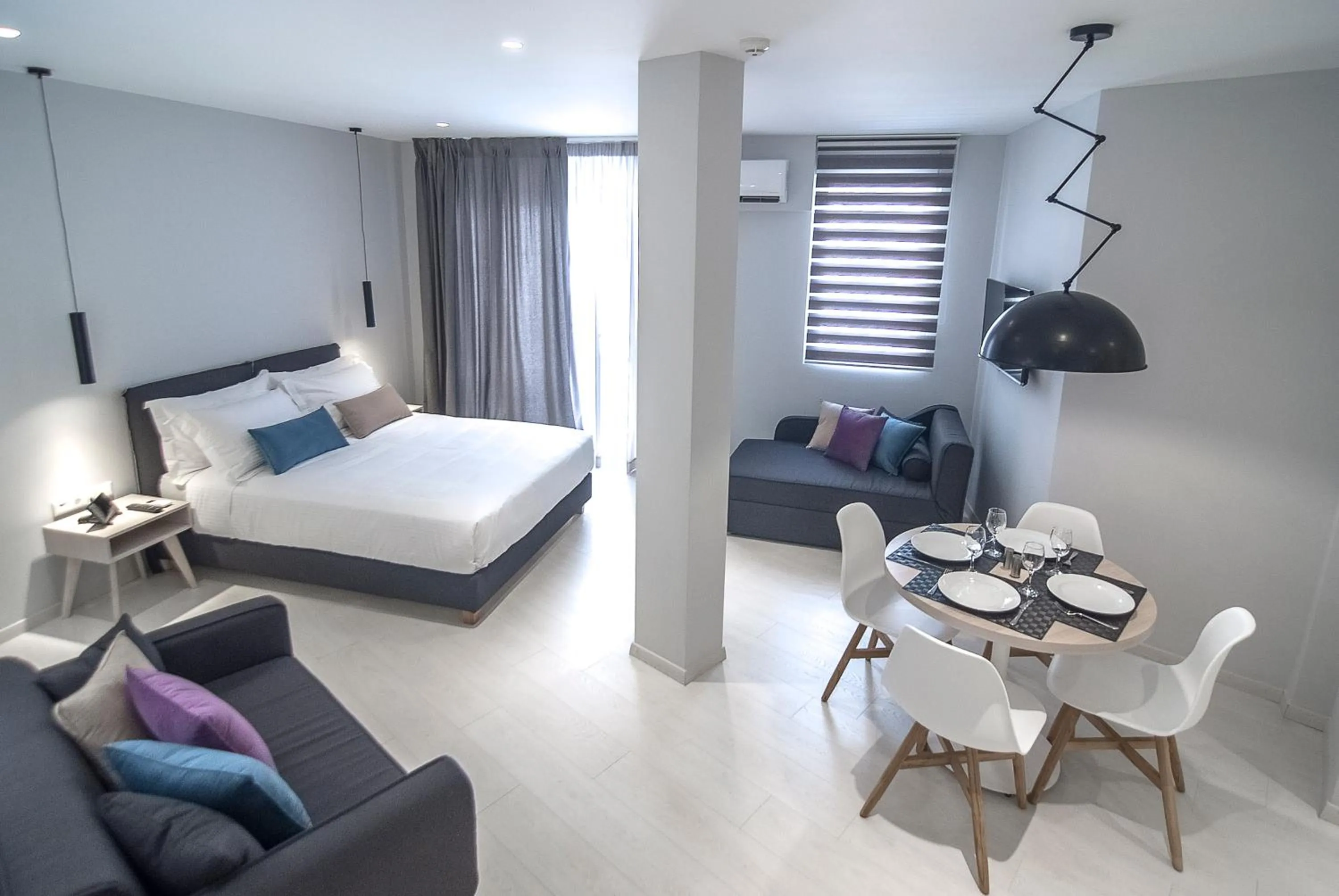 Seating area, Bed in Acropolis Stay