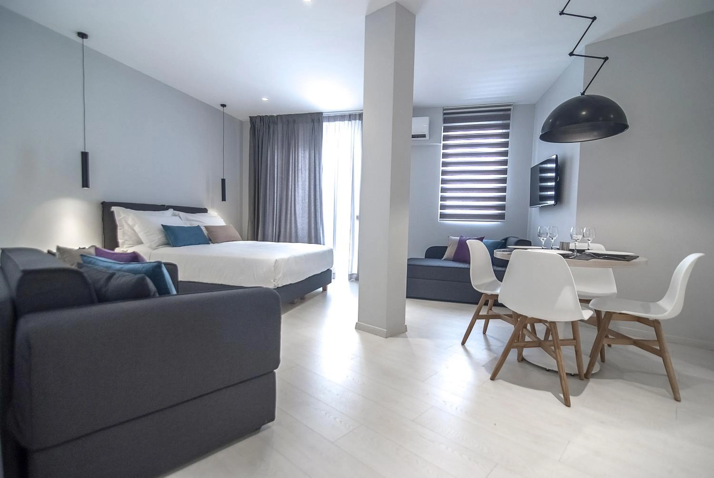 Seating area, Bed in Acropolis Stay