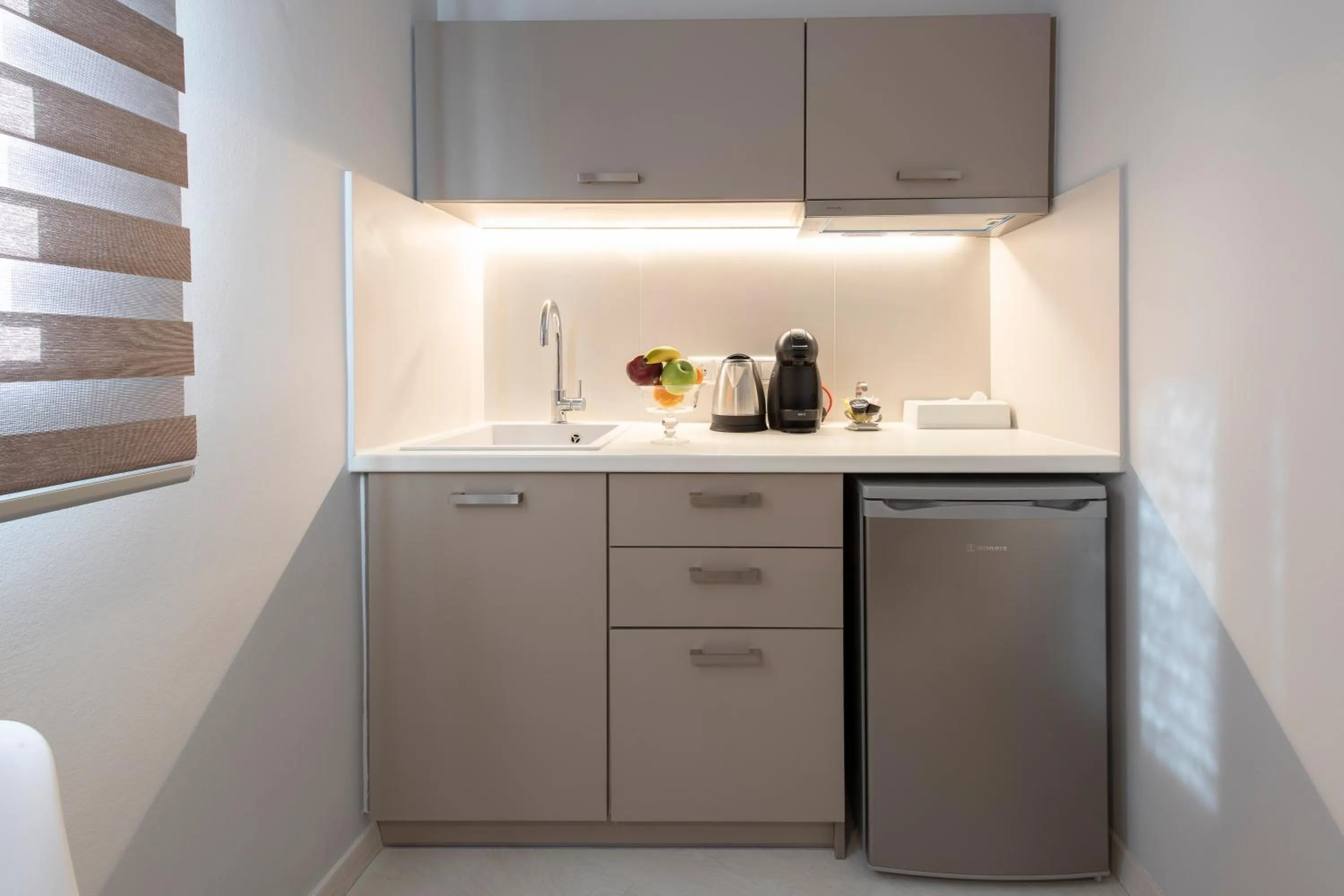 Kitchen or kitchenette in Acropolis Stay