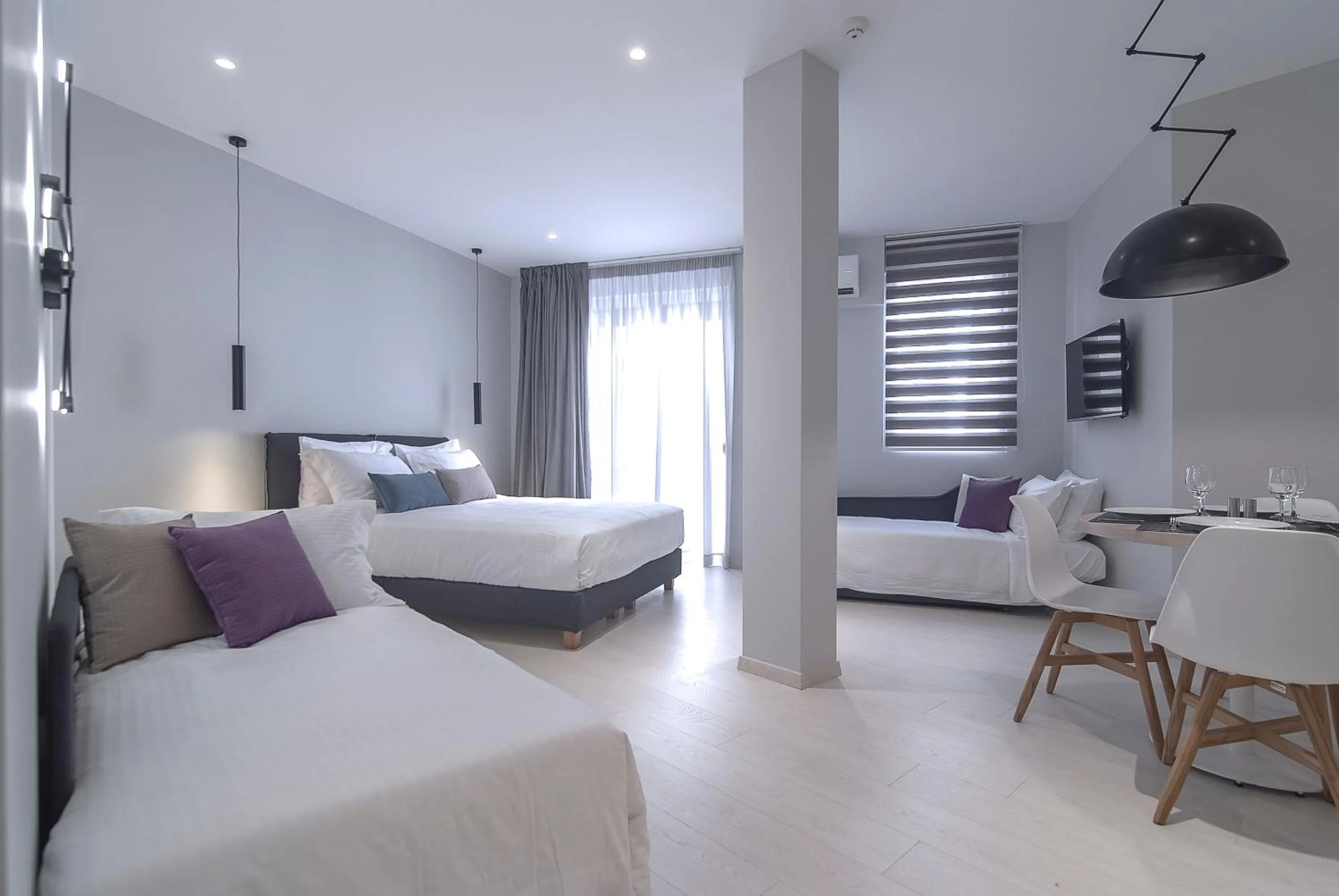 Seating area, Bed in Acropolis Stay