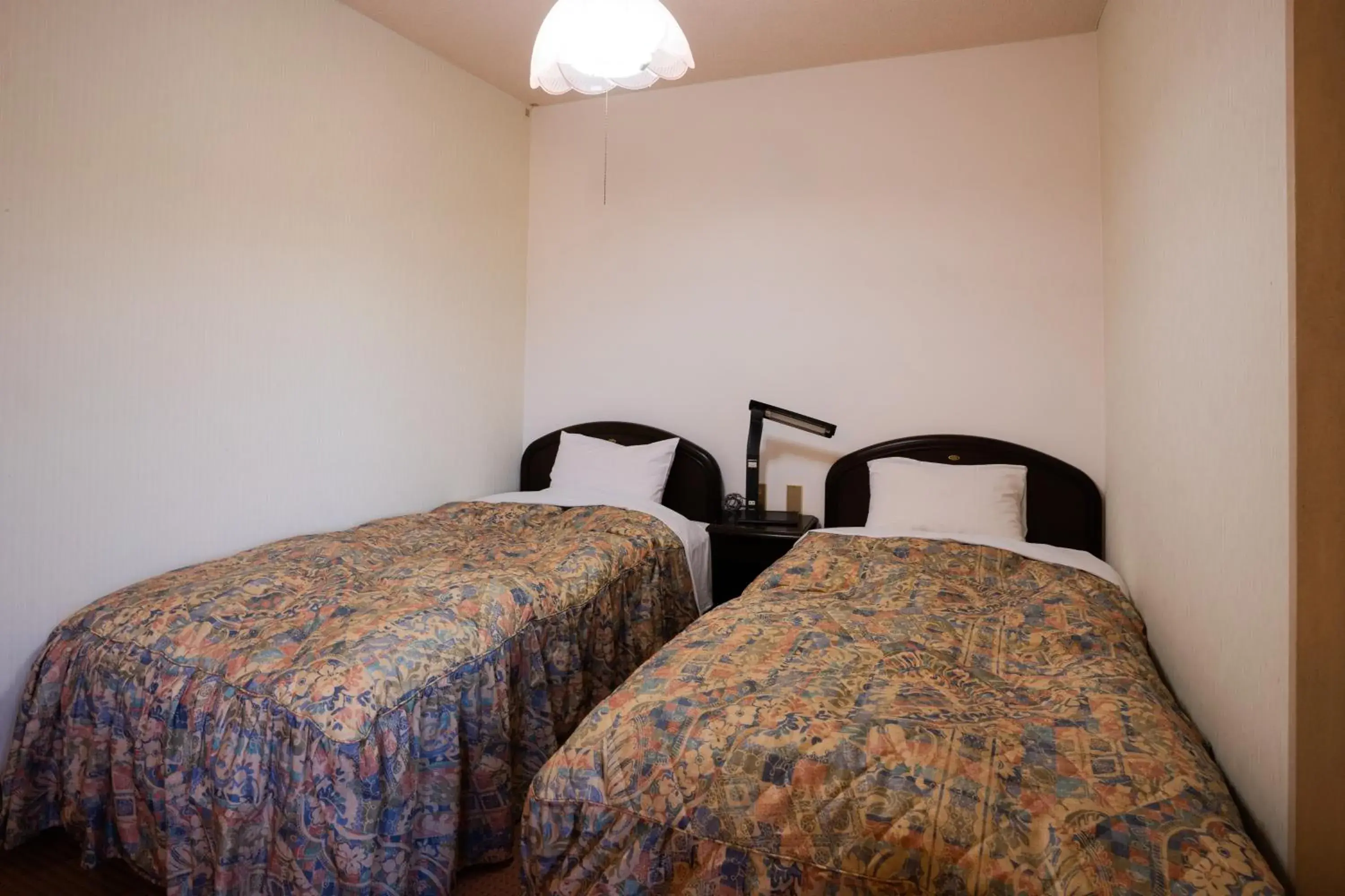 Bed in Hotel Yakushima Sanso Bed in Hotel Yakushima Sanso