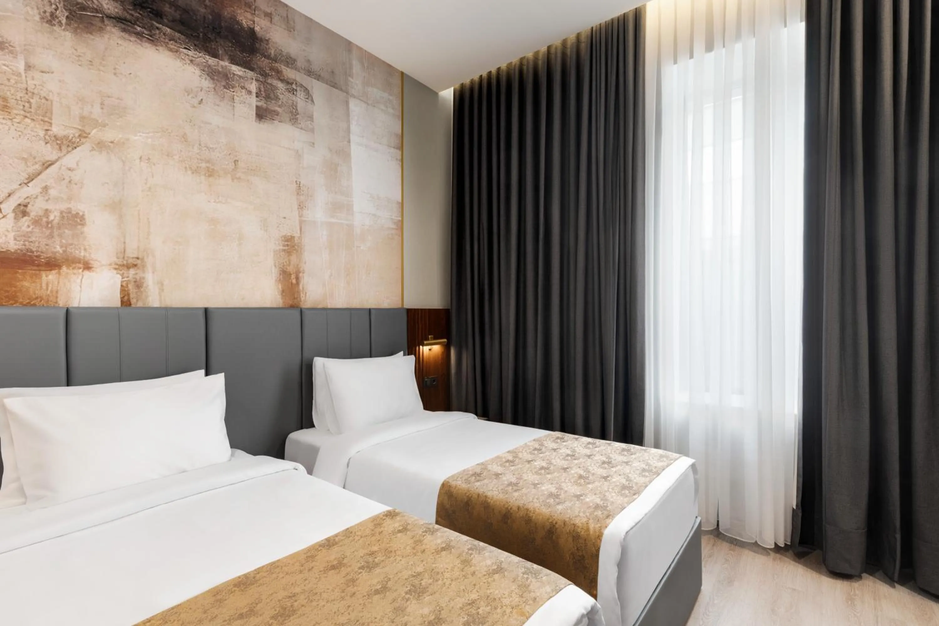 Seating area, Bed in Tbilisi Chambers, Trademark Collection by Wyndham