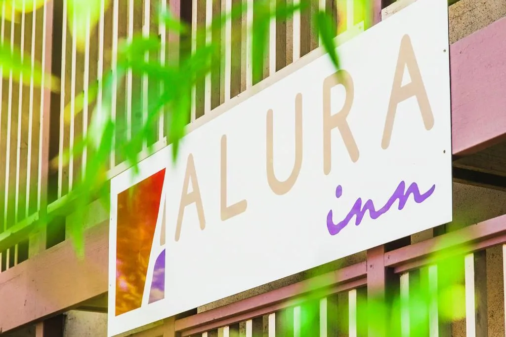 Property logo or sign in Alura Inn