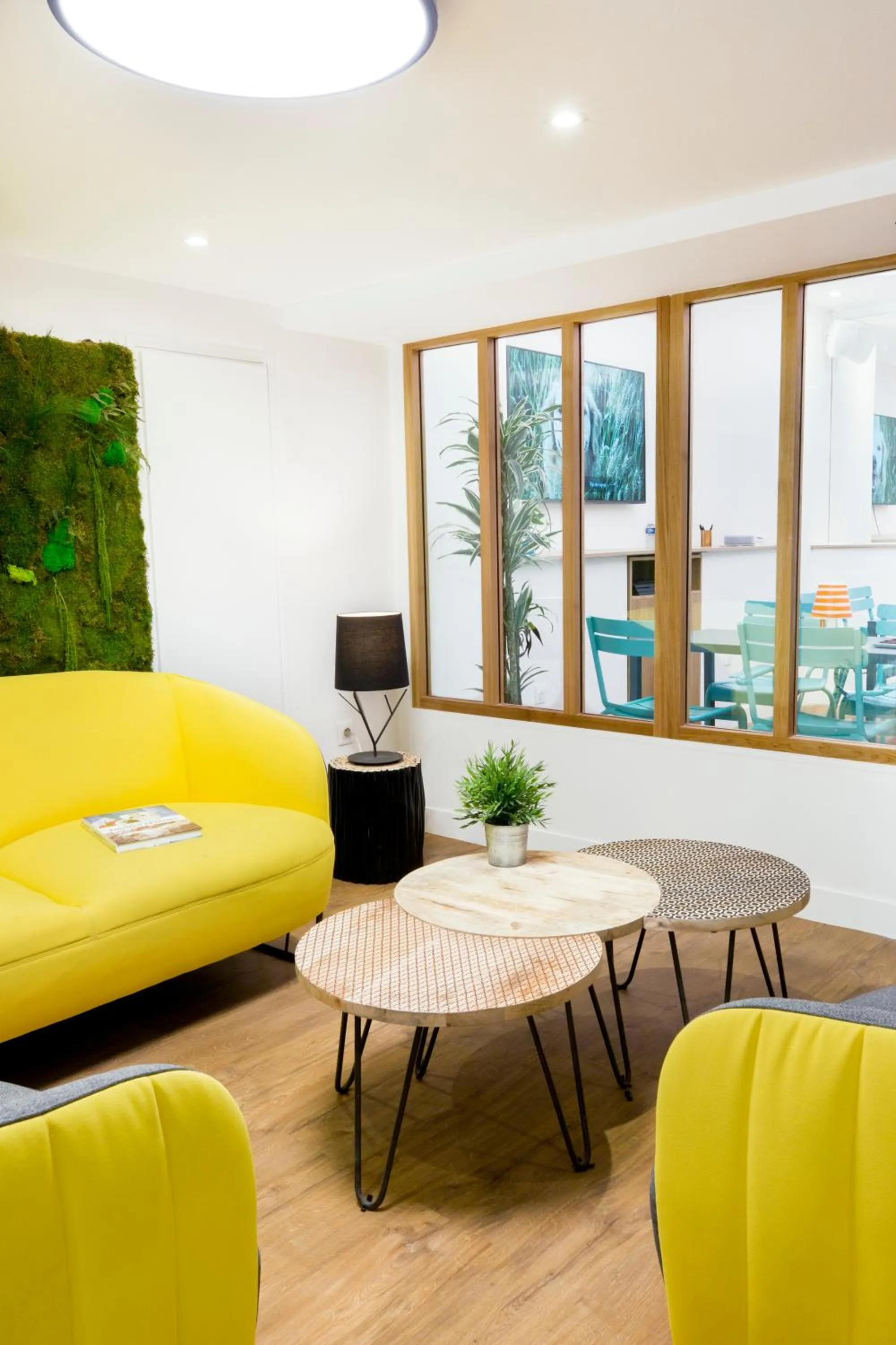 Seating area in Hotel The Playce by Happyculture