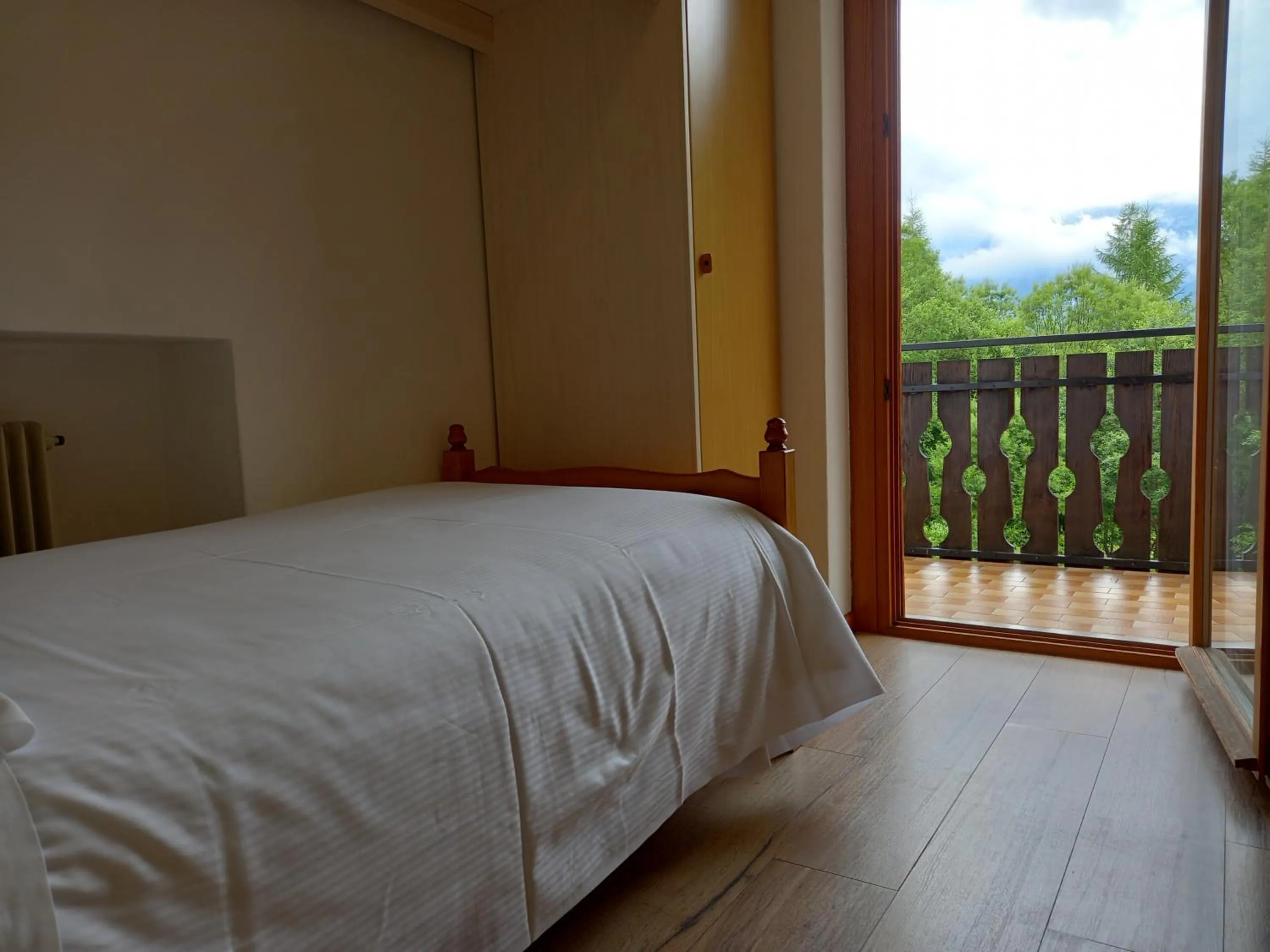 Bed in Albergo Scoiattolo