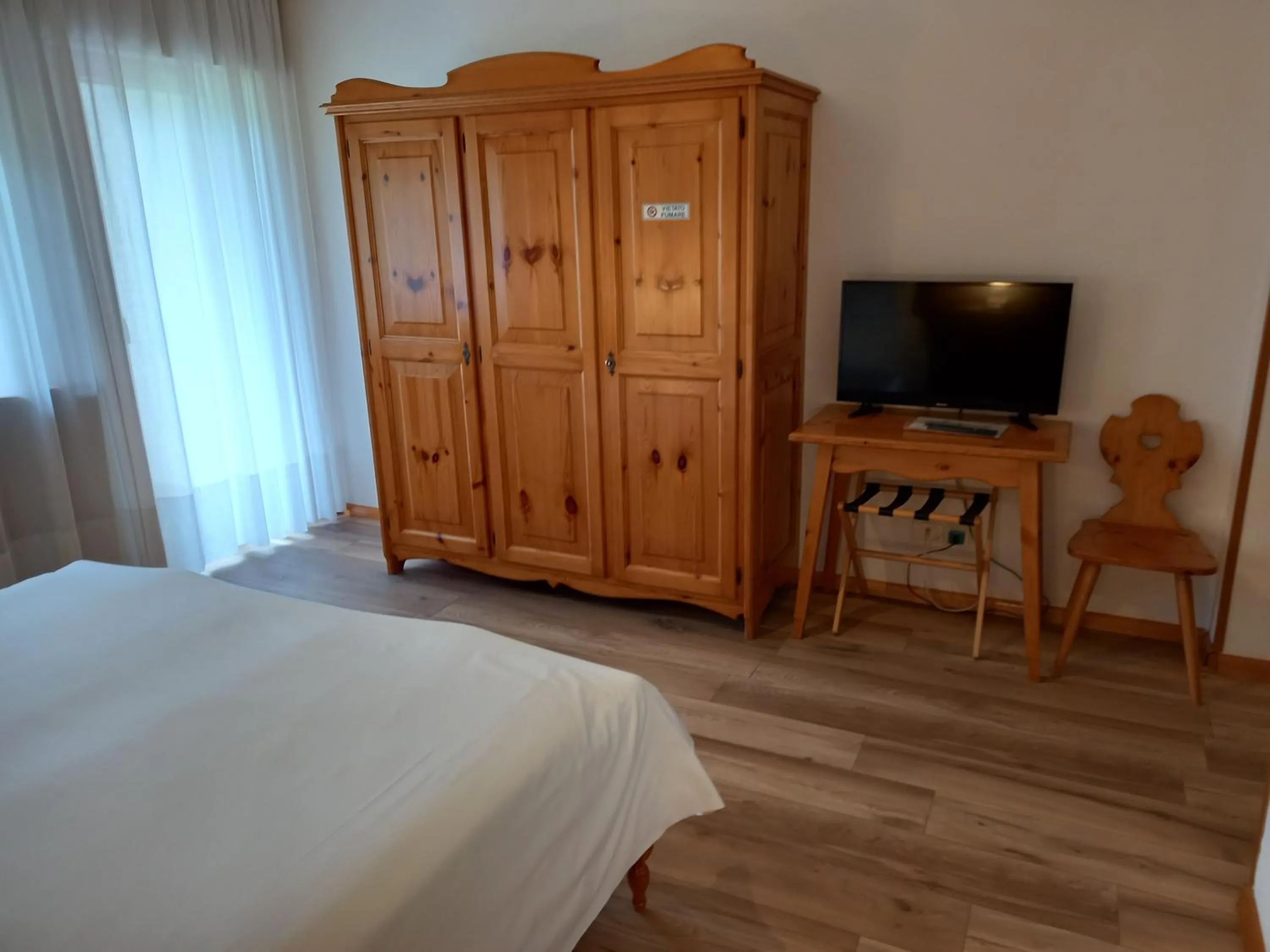 Bed in Albergo Scoiattolo