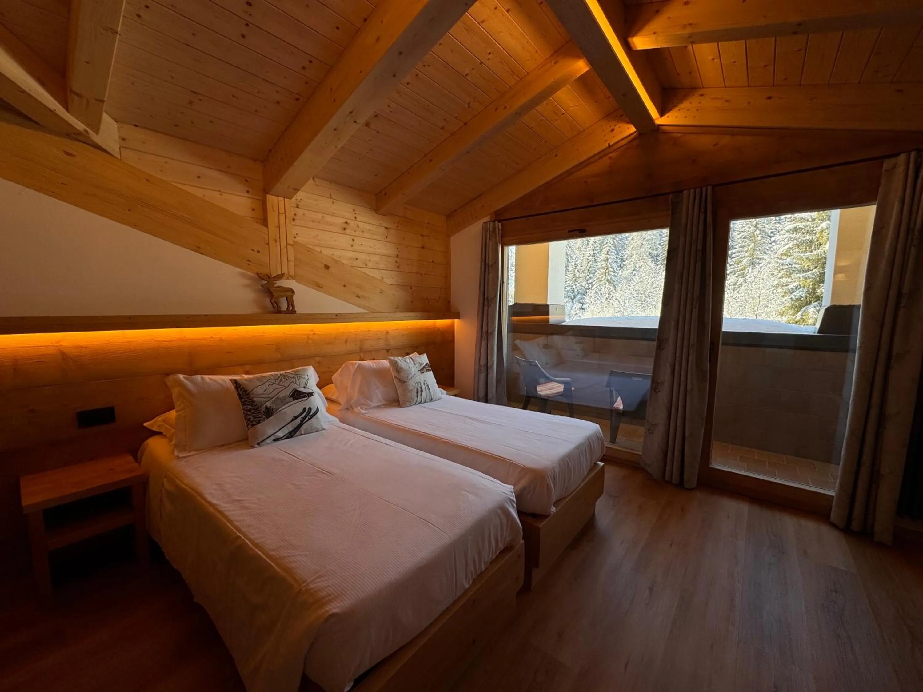 Bed in Albergo Scoiattolo