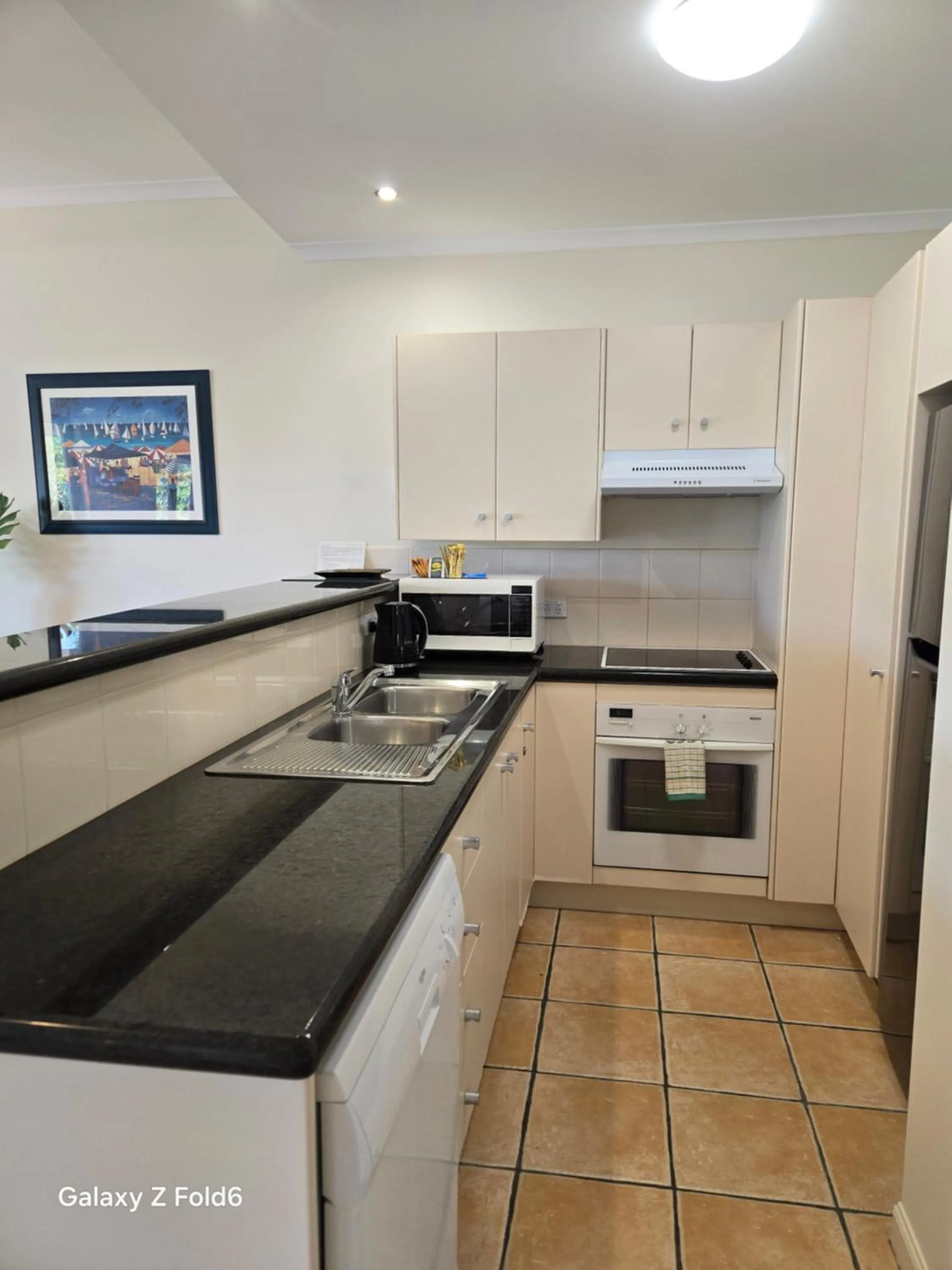 Kitchen or kitchenette in The Mediterranean Port Douglas