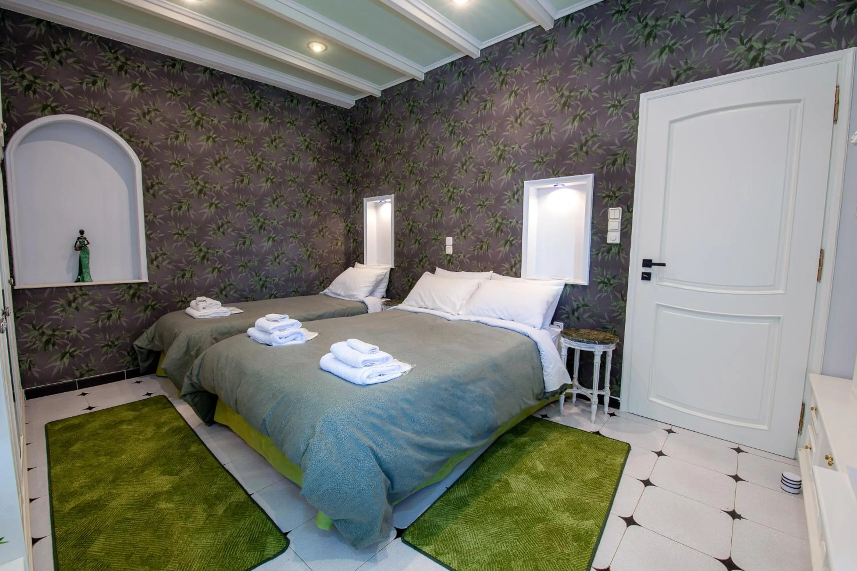 Bed in Natalie Apartments