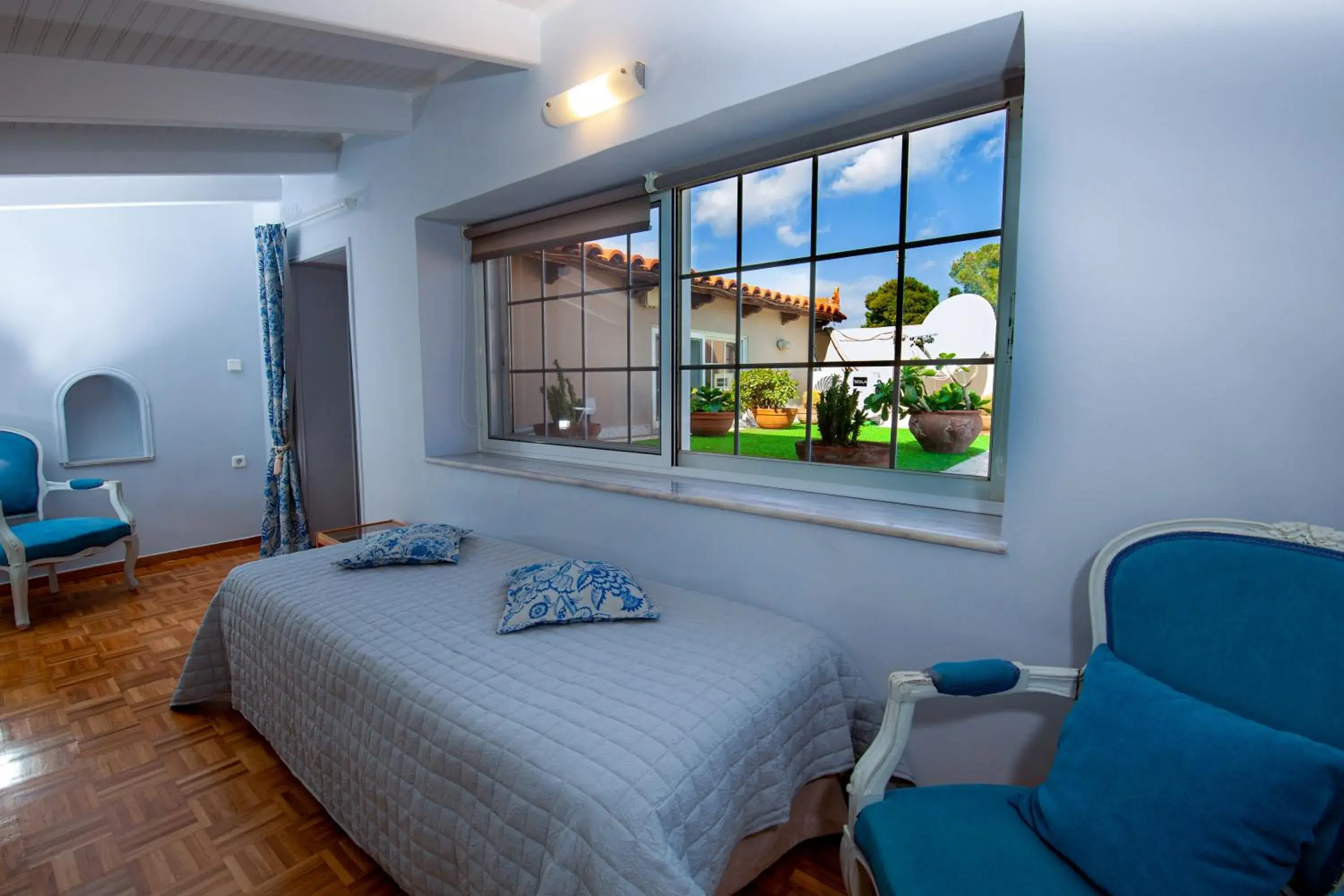 Bed in Natalie Apartments Bed in Natalie Apartments