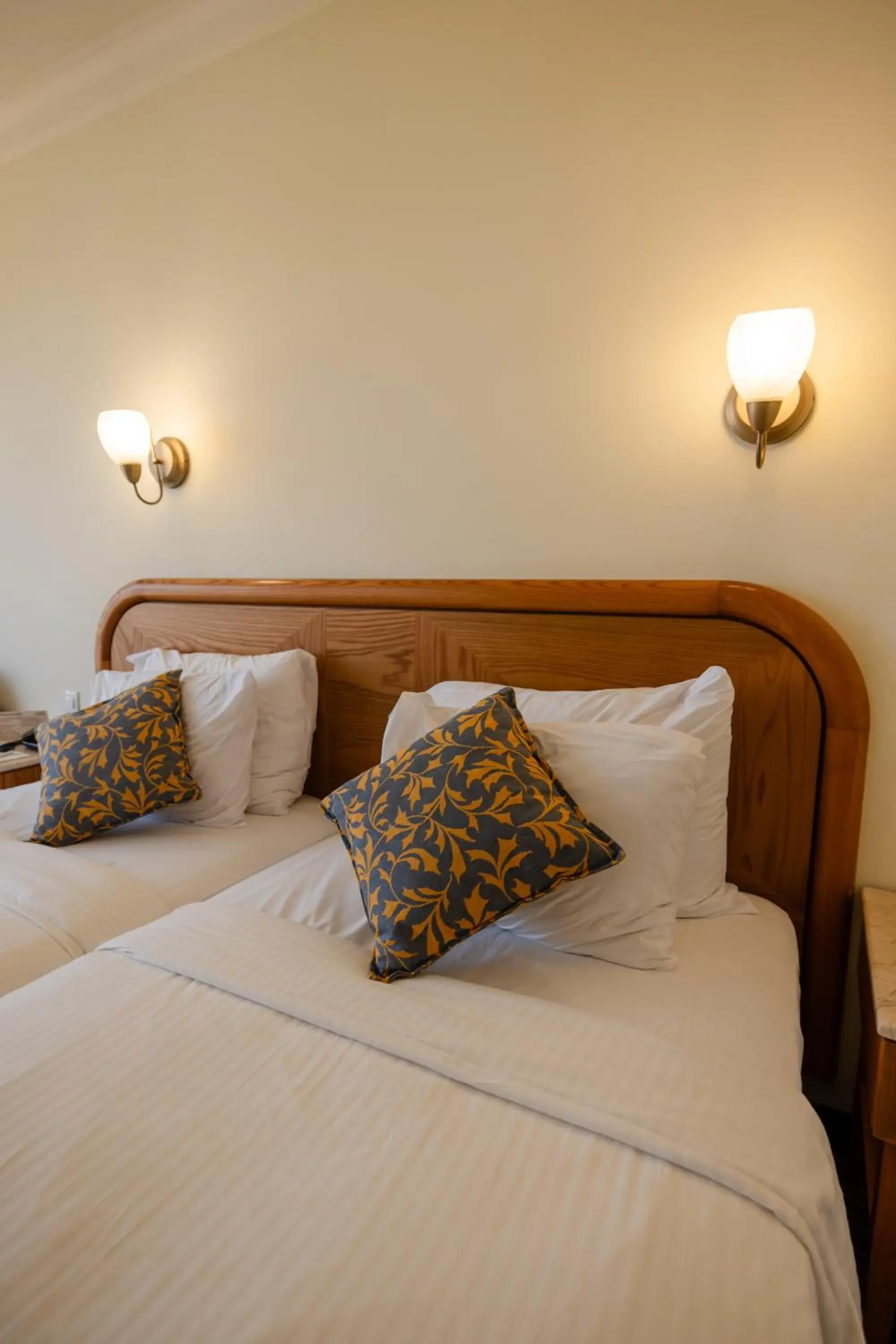 Bed in Grand Court Hotel Bed in Grand Court Hotel