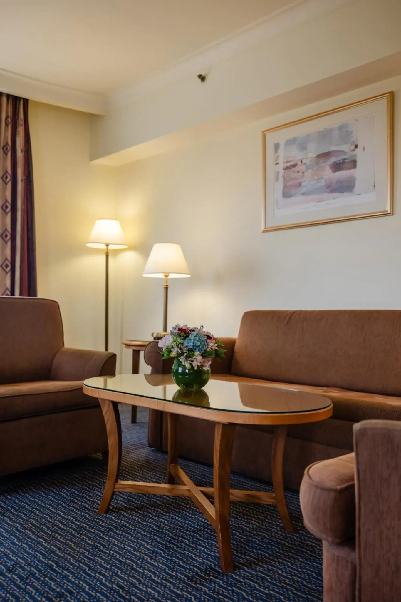 Living room in Grand Court Hotel Living room in Grand Court Hotel