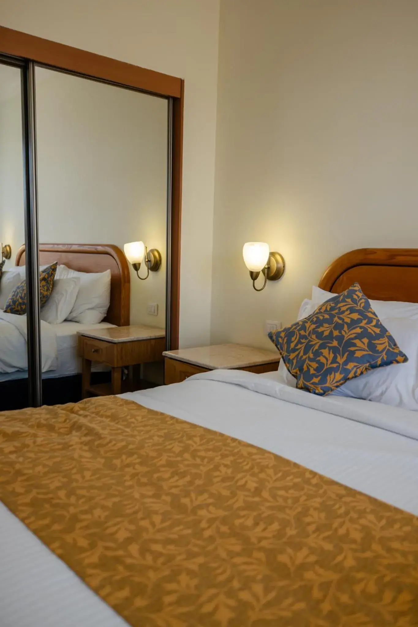 Bedroom, Bed in Grand Court Hotel Bedroom, Bed in Grand Court Hotel