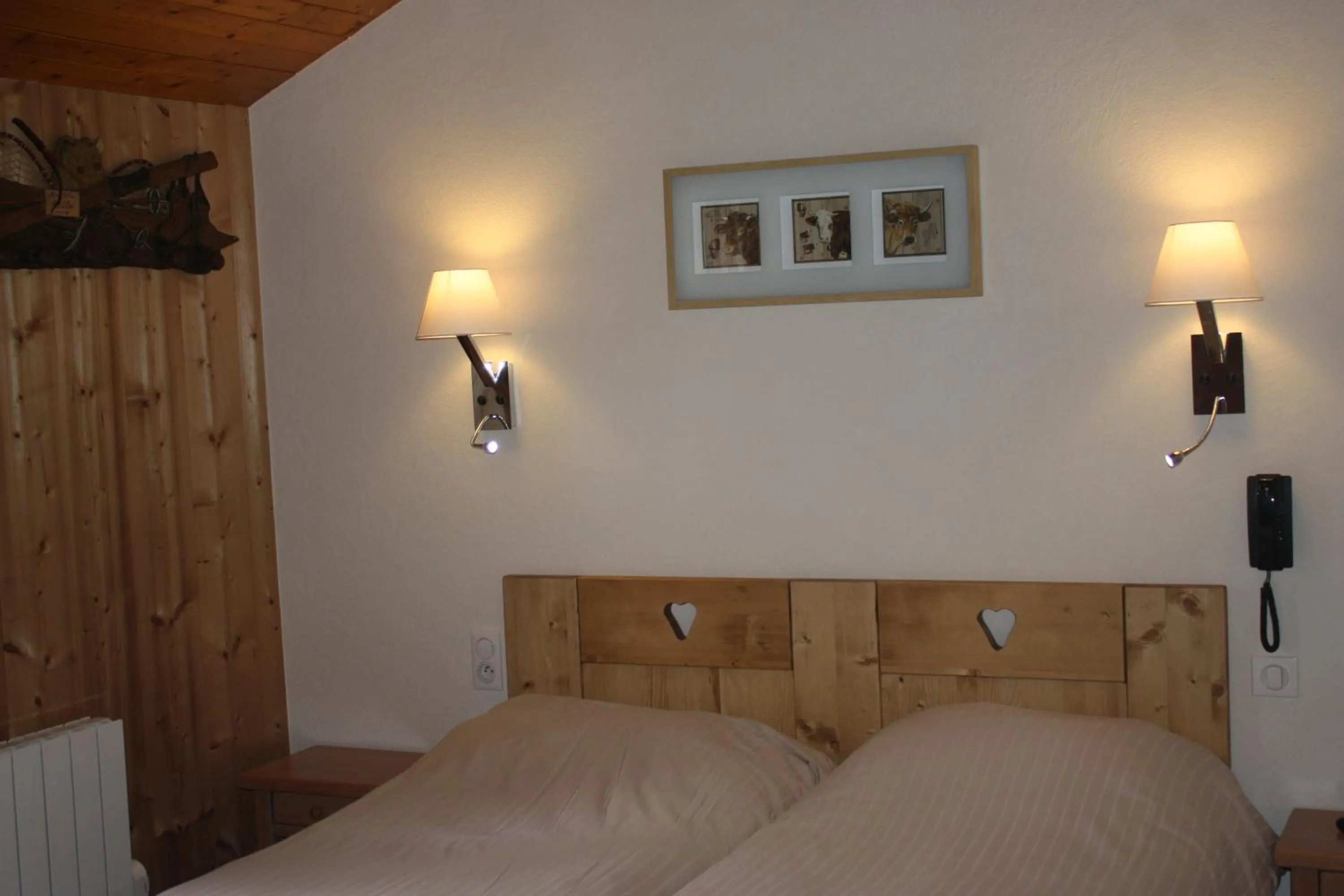 Decorative detail, Bed in Logis Hotel Gai Soleil