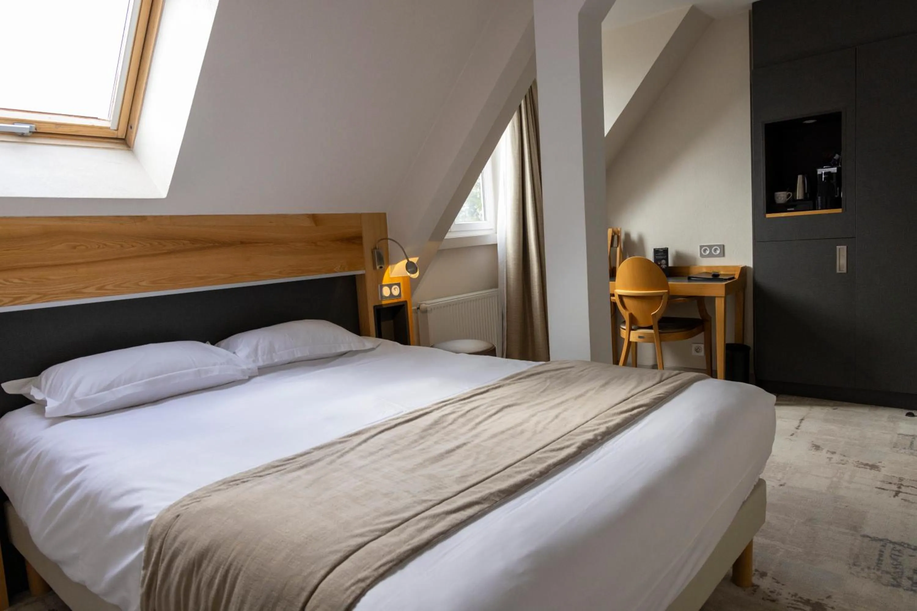 Bed in Hotel Le Cercle