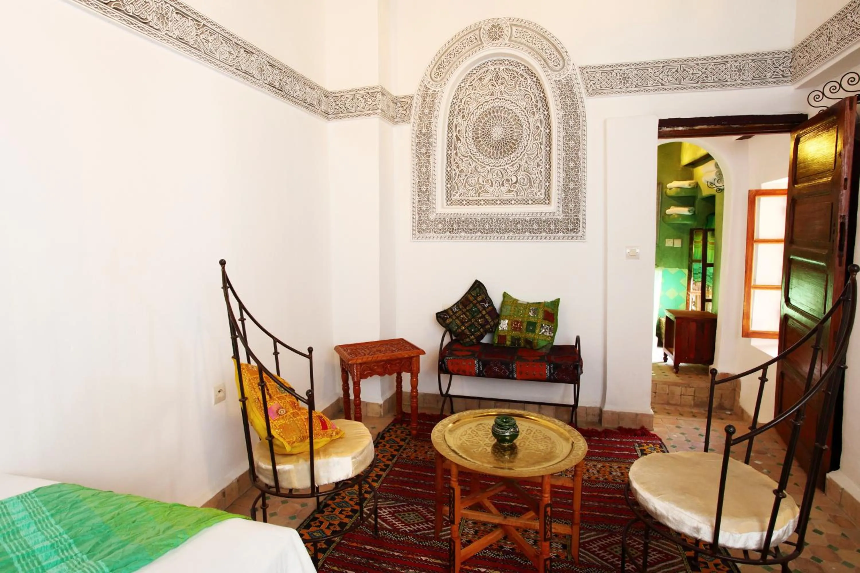 Seating area, Bed in Riad Jamaï