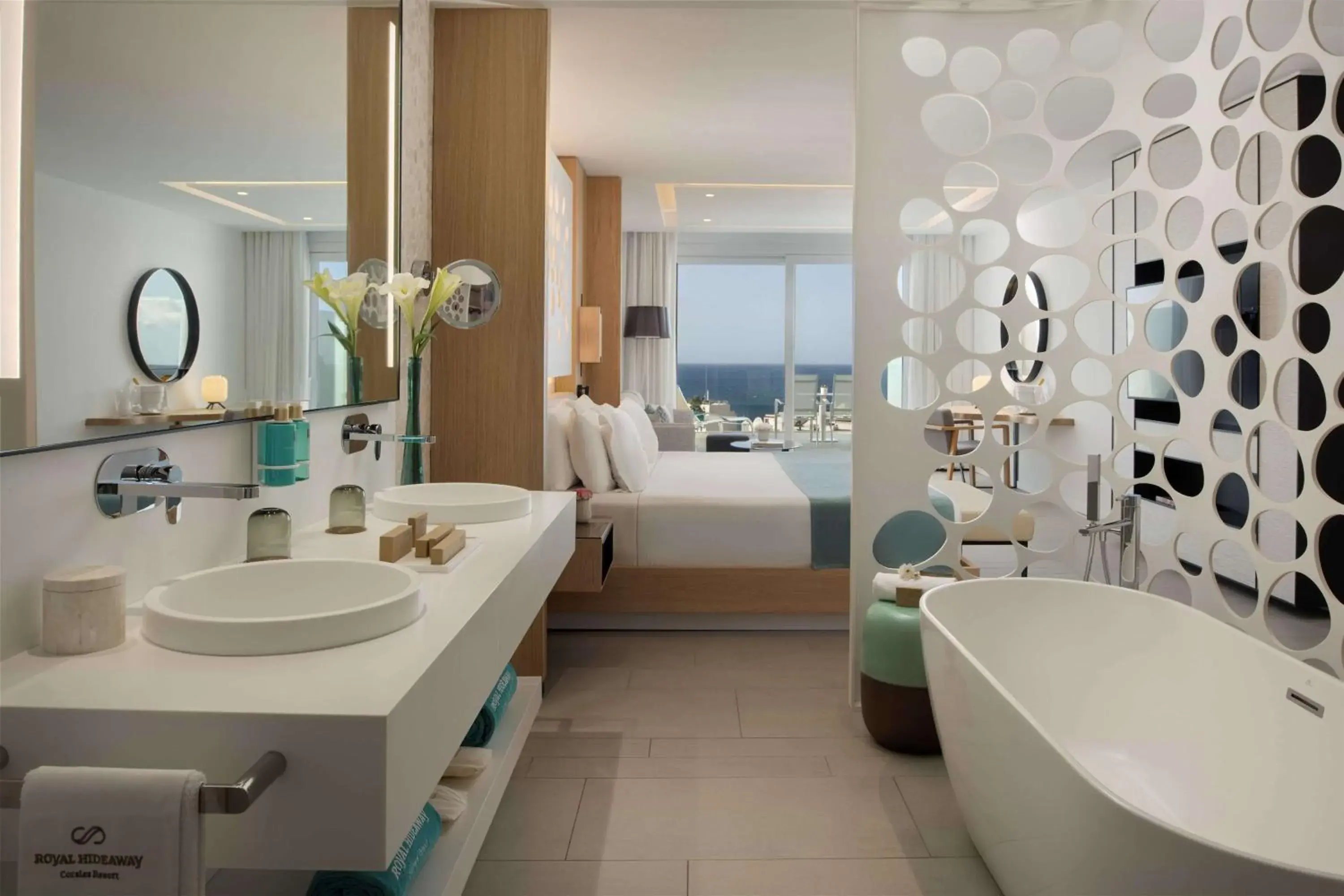 Bathroom, Bed in Royal Hideaway Corales Beach - Adults Only Bathroom, Bed in Royal Hideaway Corales Beach - Adults Only