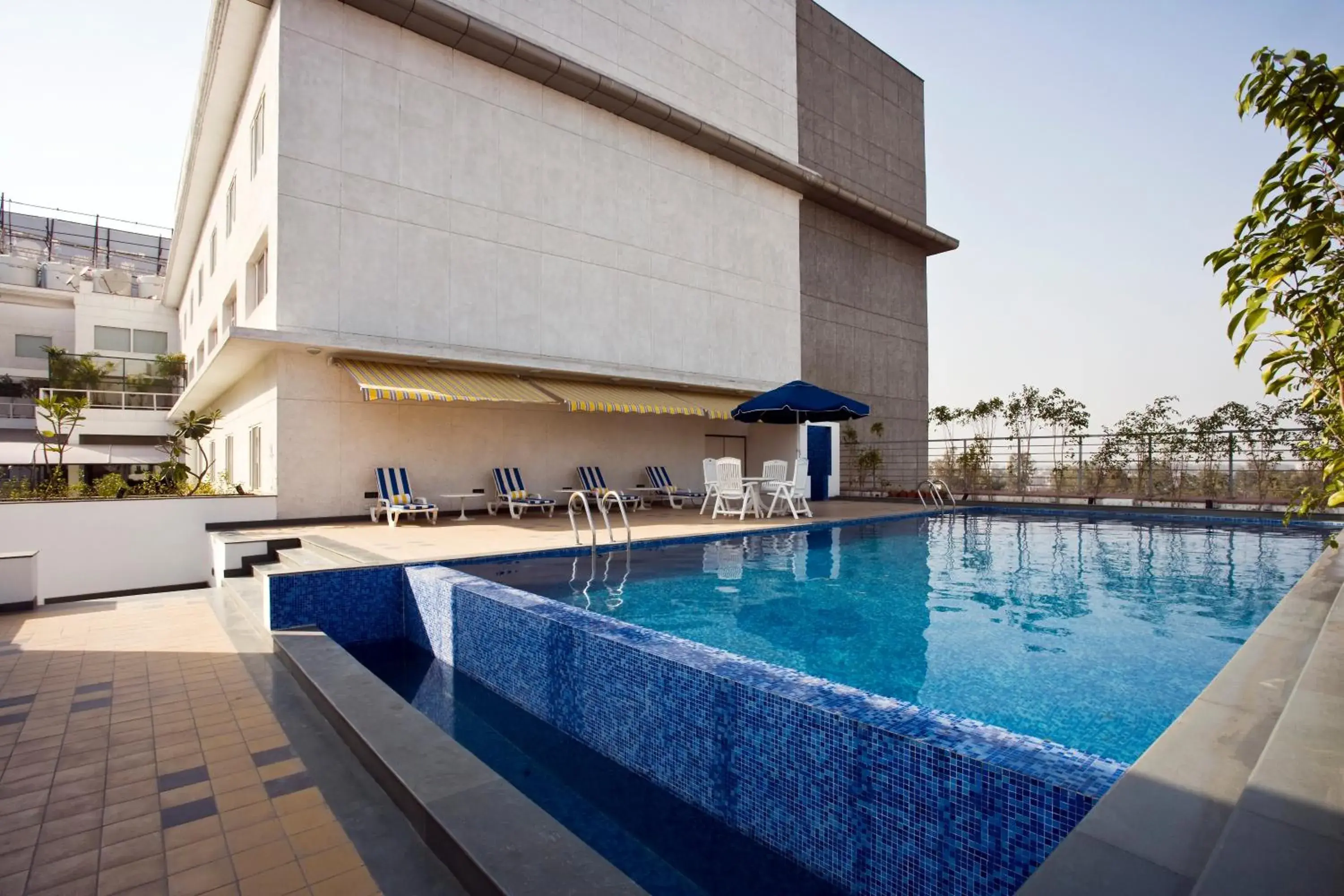 Swimming pool in Lemon Tree Hotel, East Delhi Mall, Kaushambi Swimming pool in Lemon Tree Hotel, East Delhi Mall, Kaushambi