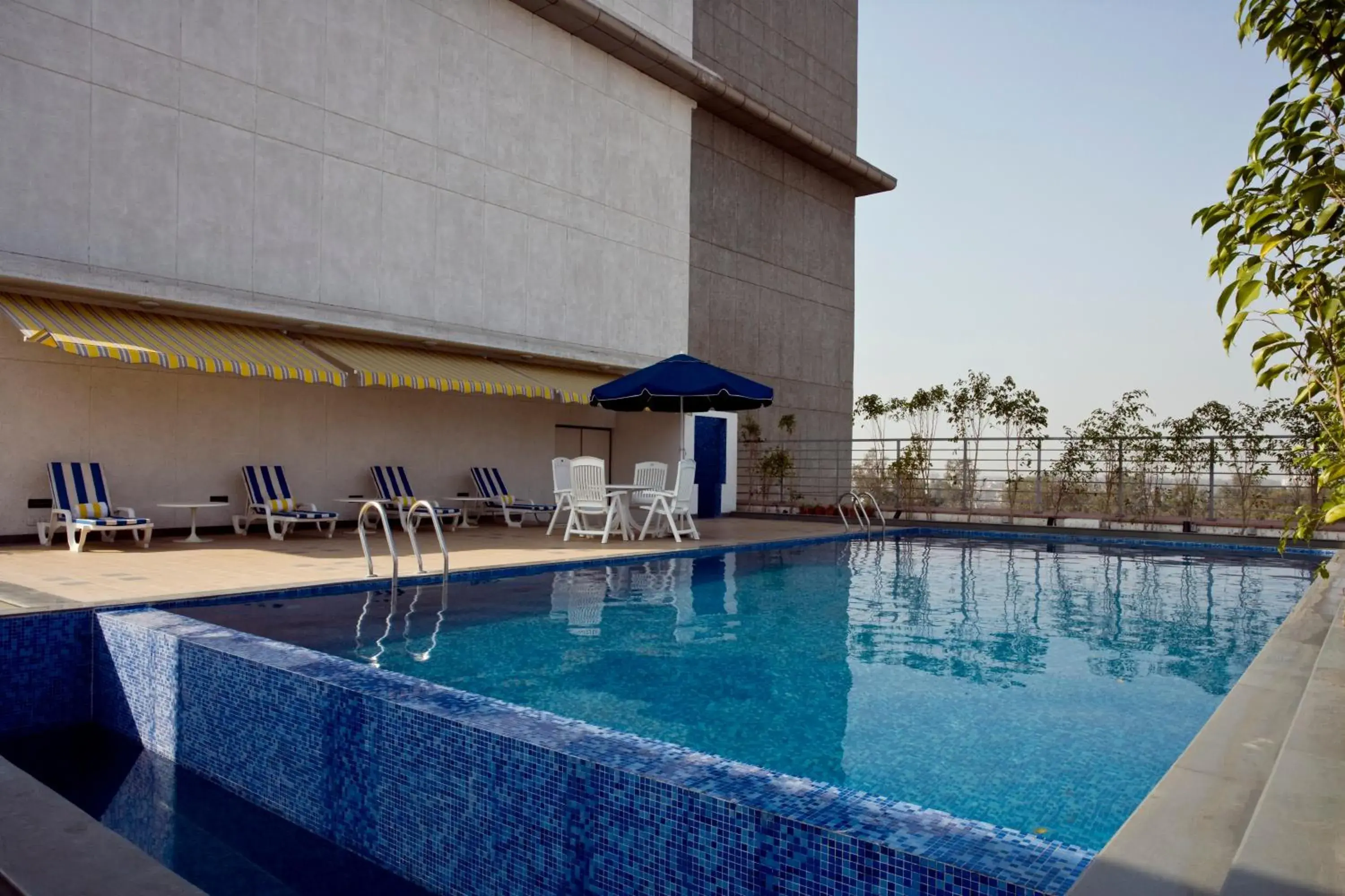 Swimming pool in Lemon Tree Hotel, East Delhi Mall, Kaushambi Swimming pool in Lemon Tree Hotel, East Delhi Mall, Kaushambi