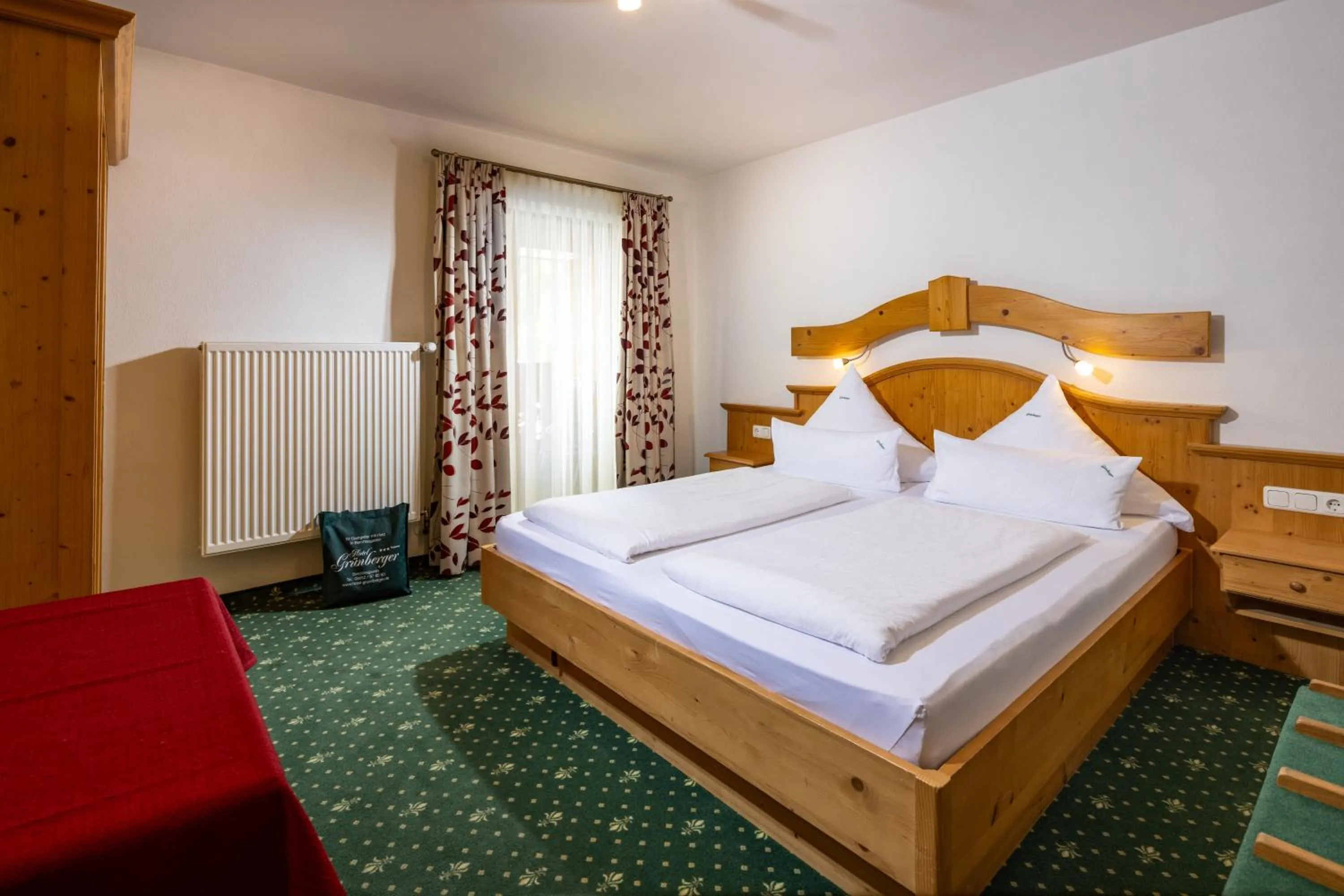 Photo of the whole room, Bed in Hotel Gruenberger