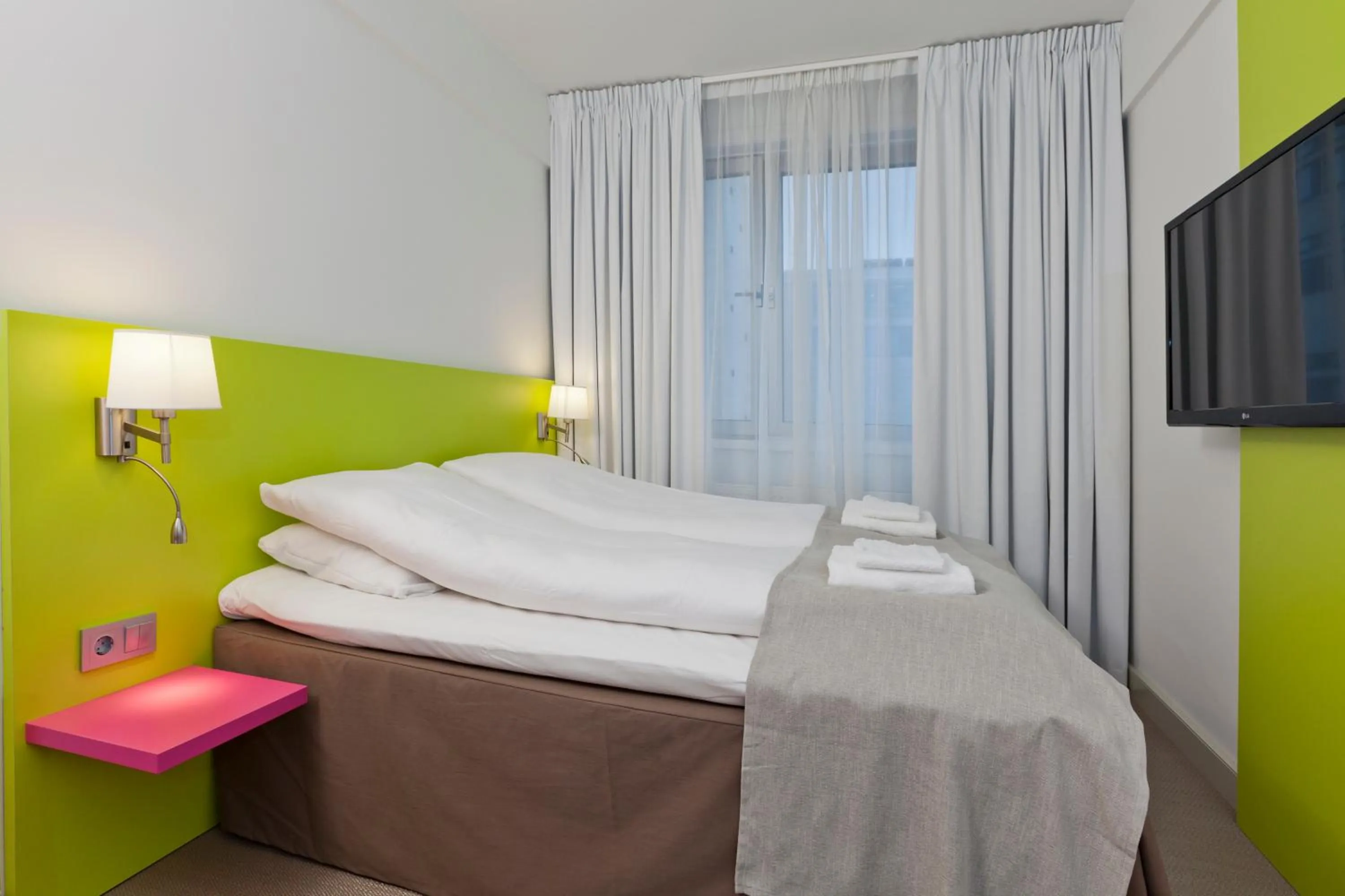 Bed in MediInn Hotel Oslo