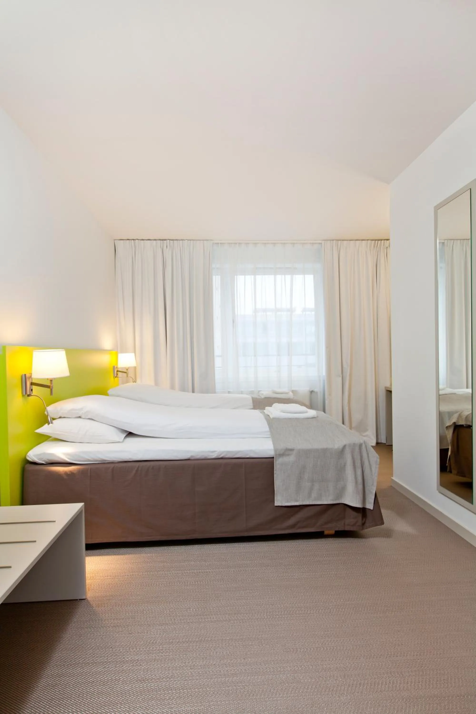 Bed in MediInn Hotel Oslo