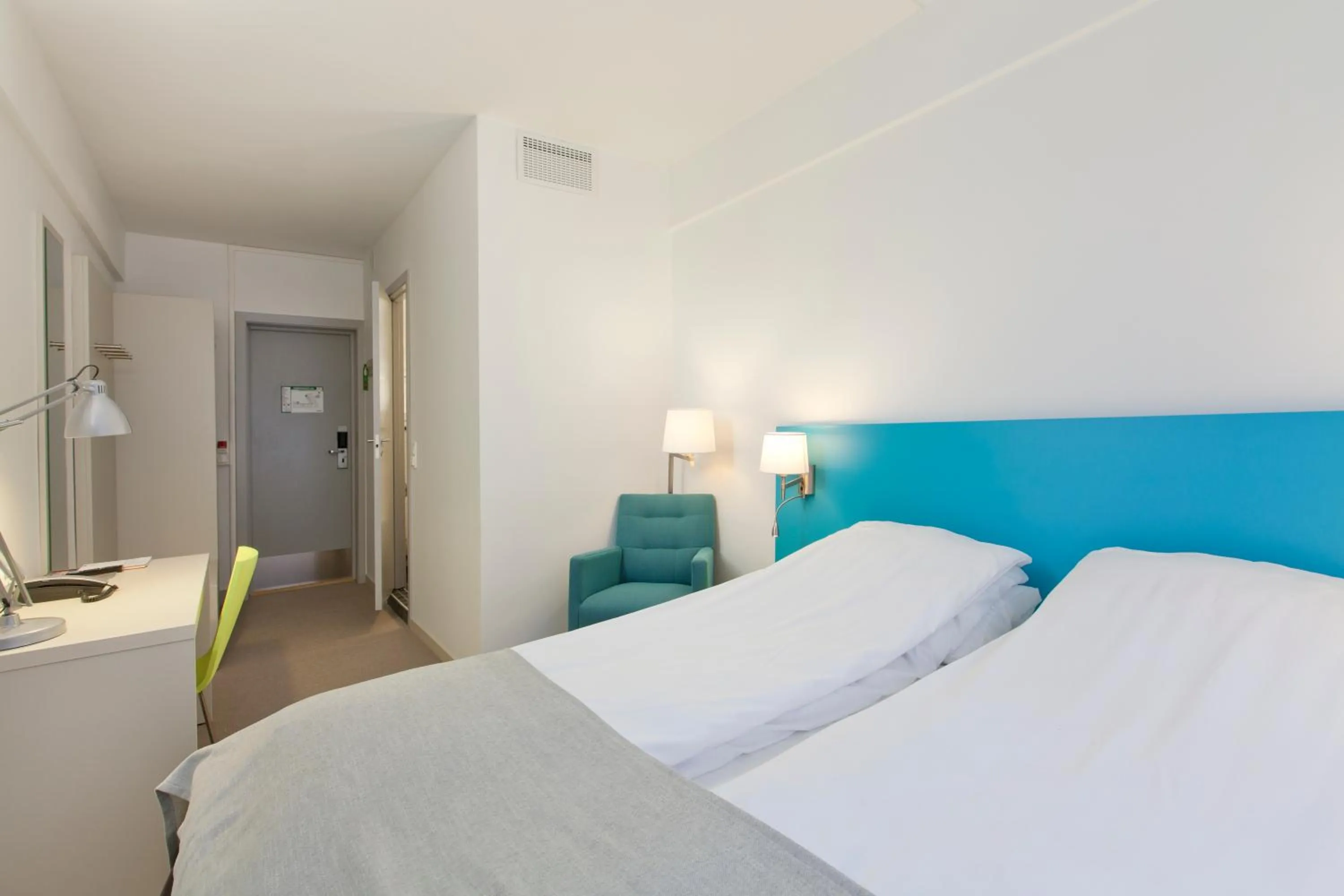 Bed in MediInn Hotel Oslo