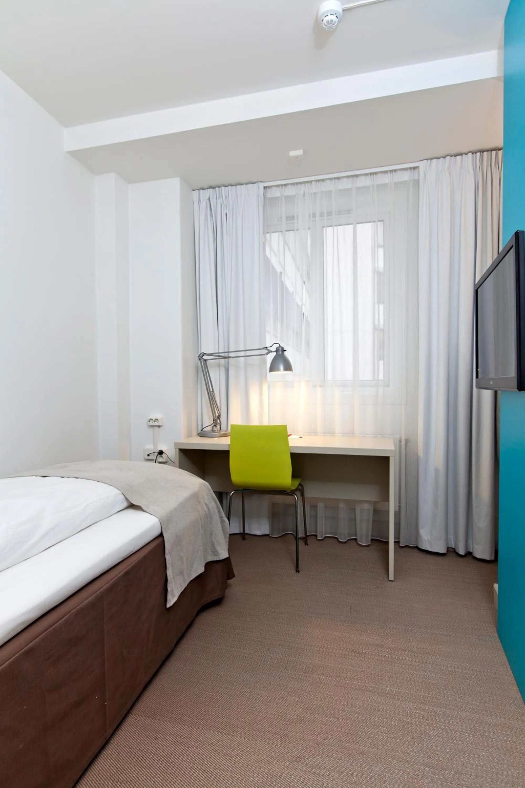 Photo of the whole room, Bed in MediInn Hotel Oslo