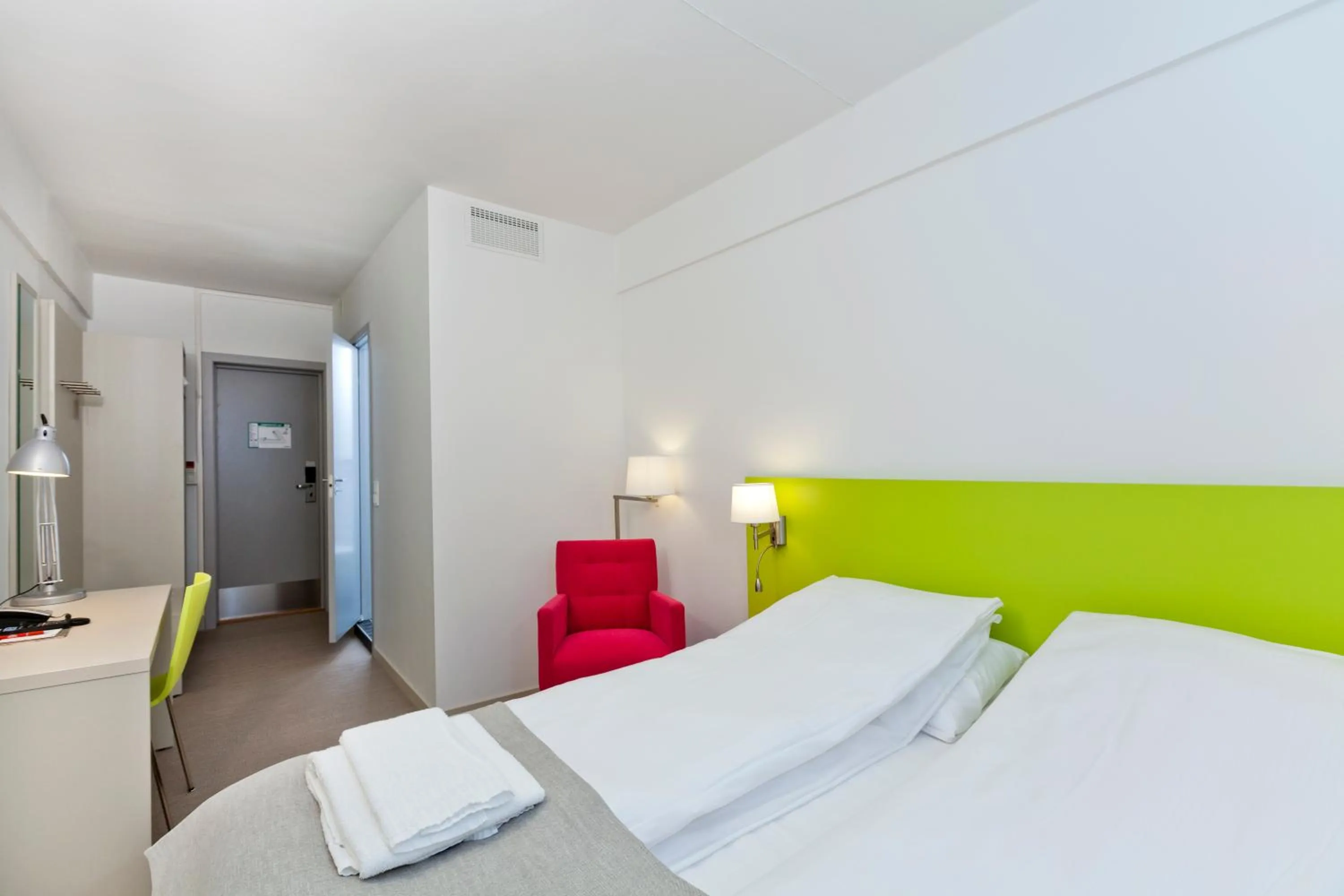 Bed in MediInn Hotel Oslo