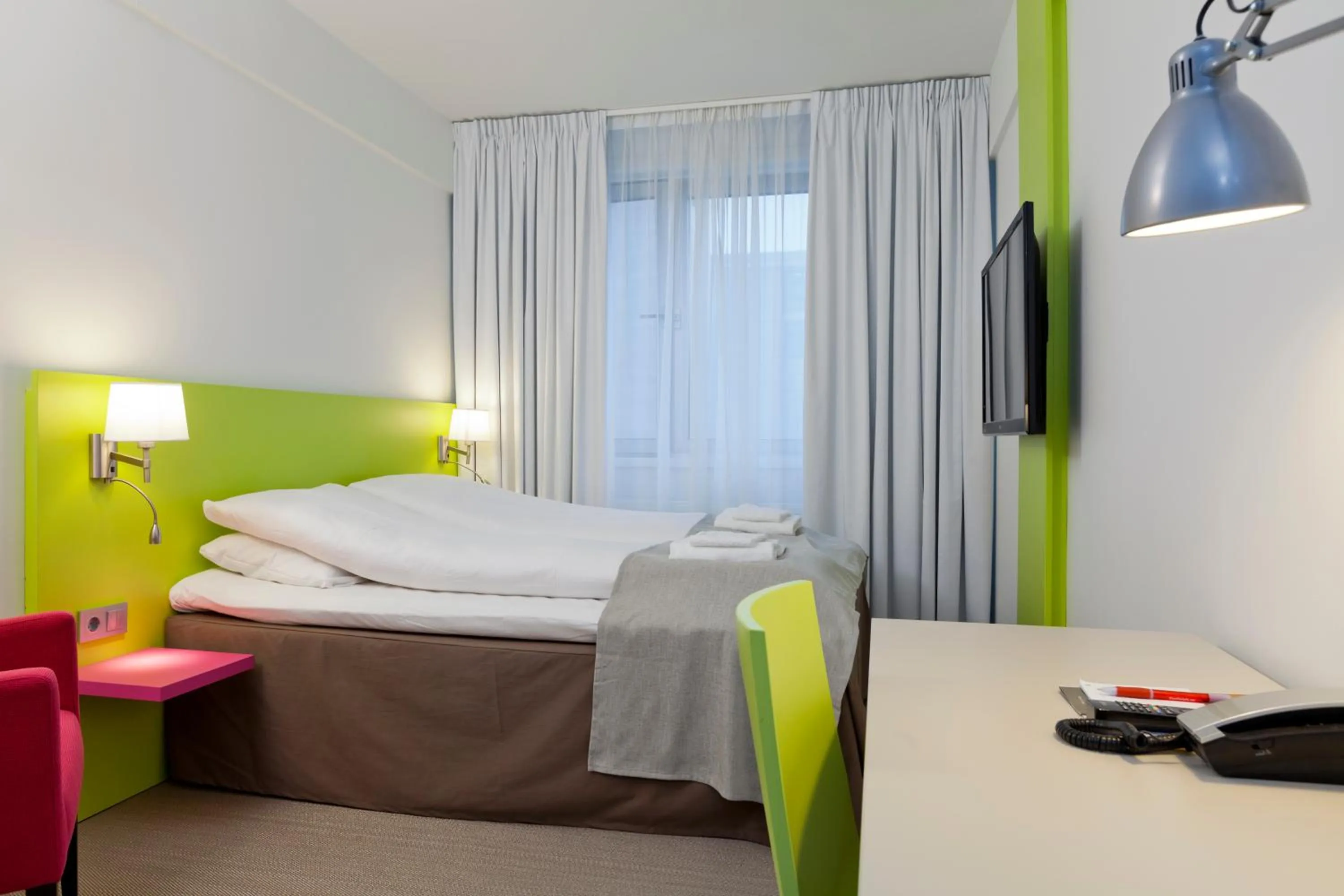 Photo of the whole room, Bed in MediInn Hotel Oslo