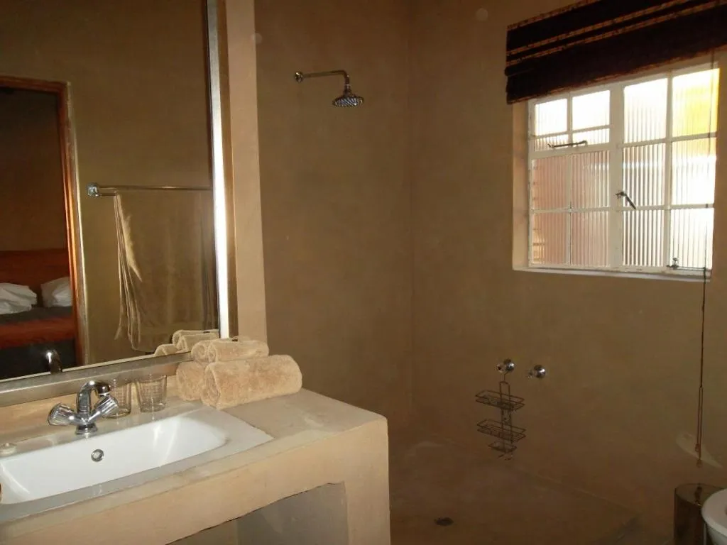 Bathroom in Ku De Ta B&B